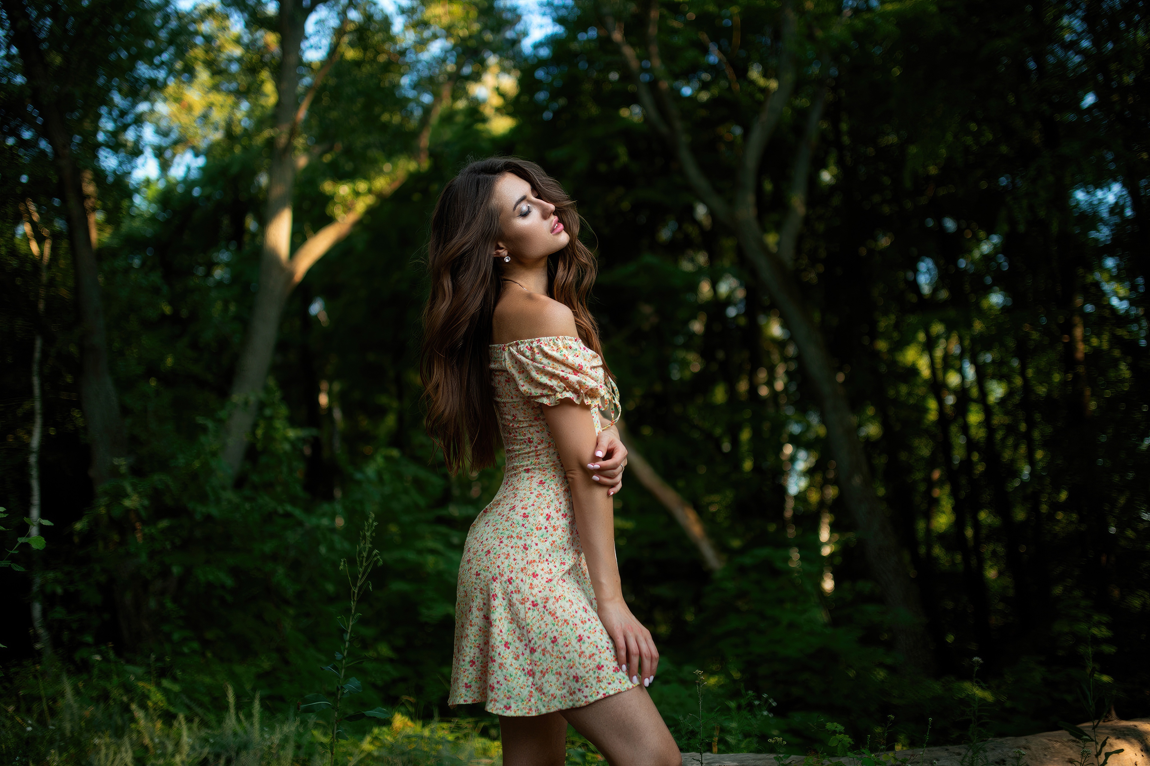 Girl in a floral dress in nature HD Wallpaper