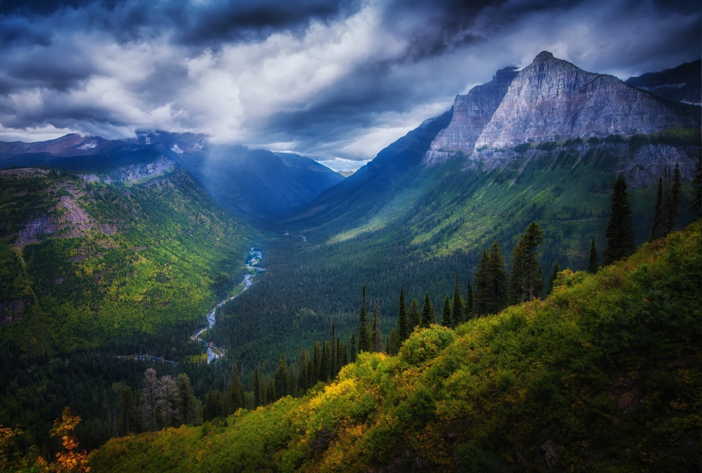 Valley with Mountains, Forest, and River under Cloudy Sky HD Wallpaper