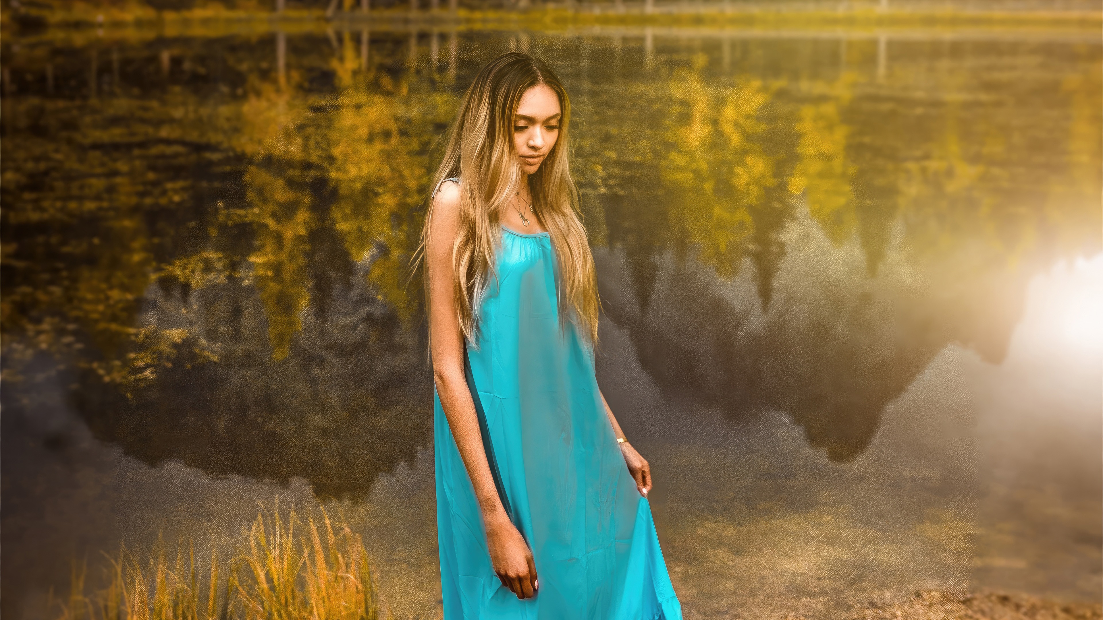 Girl in blue dress by a lake with reflections HD Wallpaper