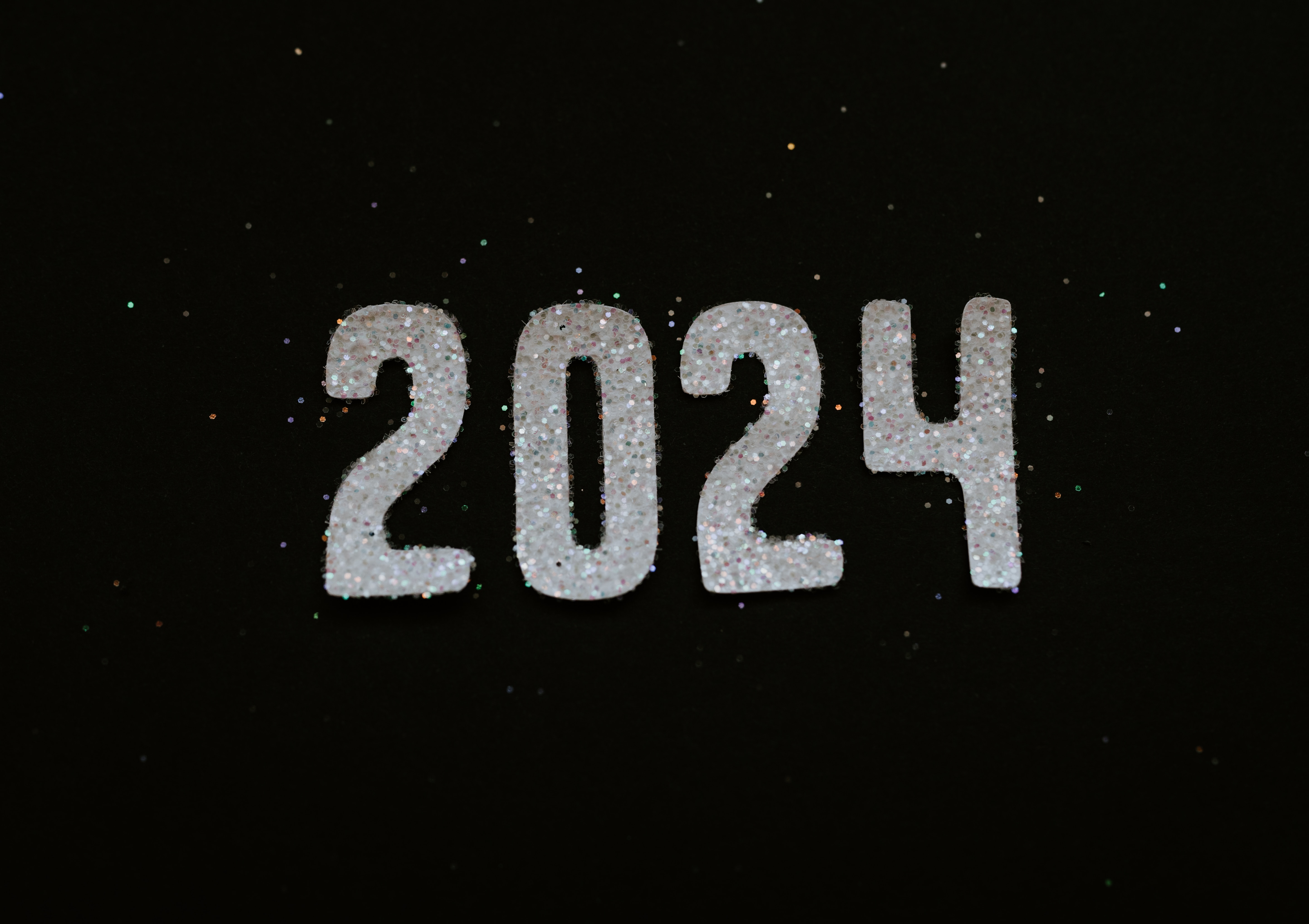Glittery 2024 numbers on black background HD Wallpaper
