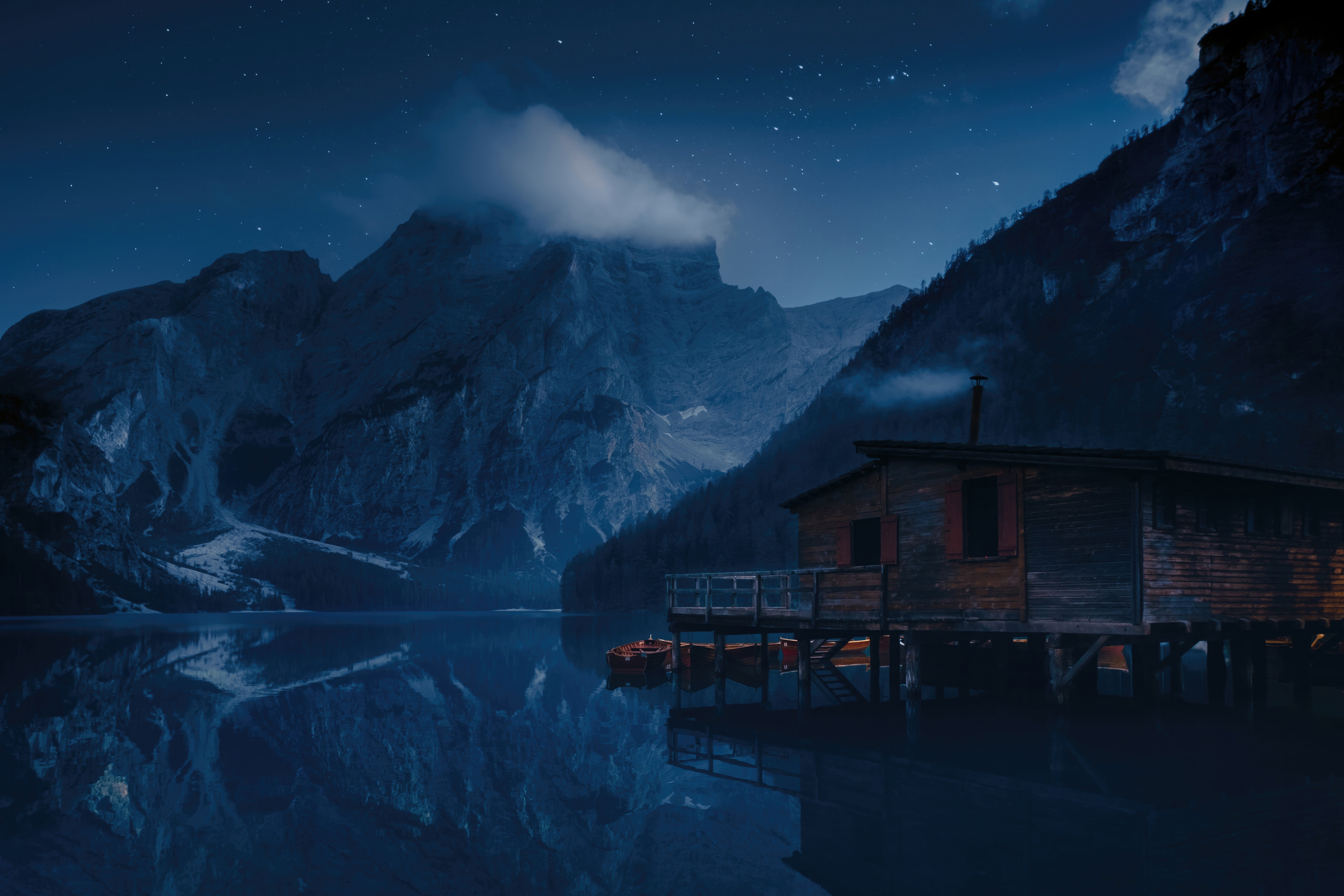 Wooden cabin on Pragser Wildsee lake at night HD Wallpaper