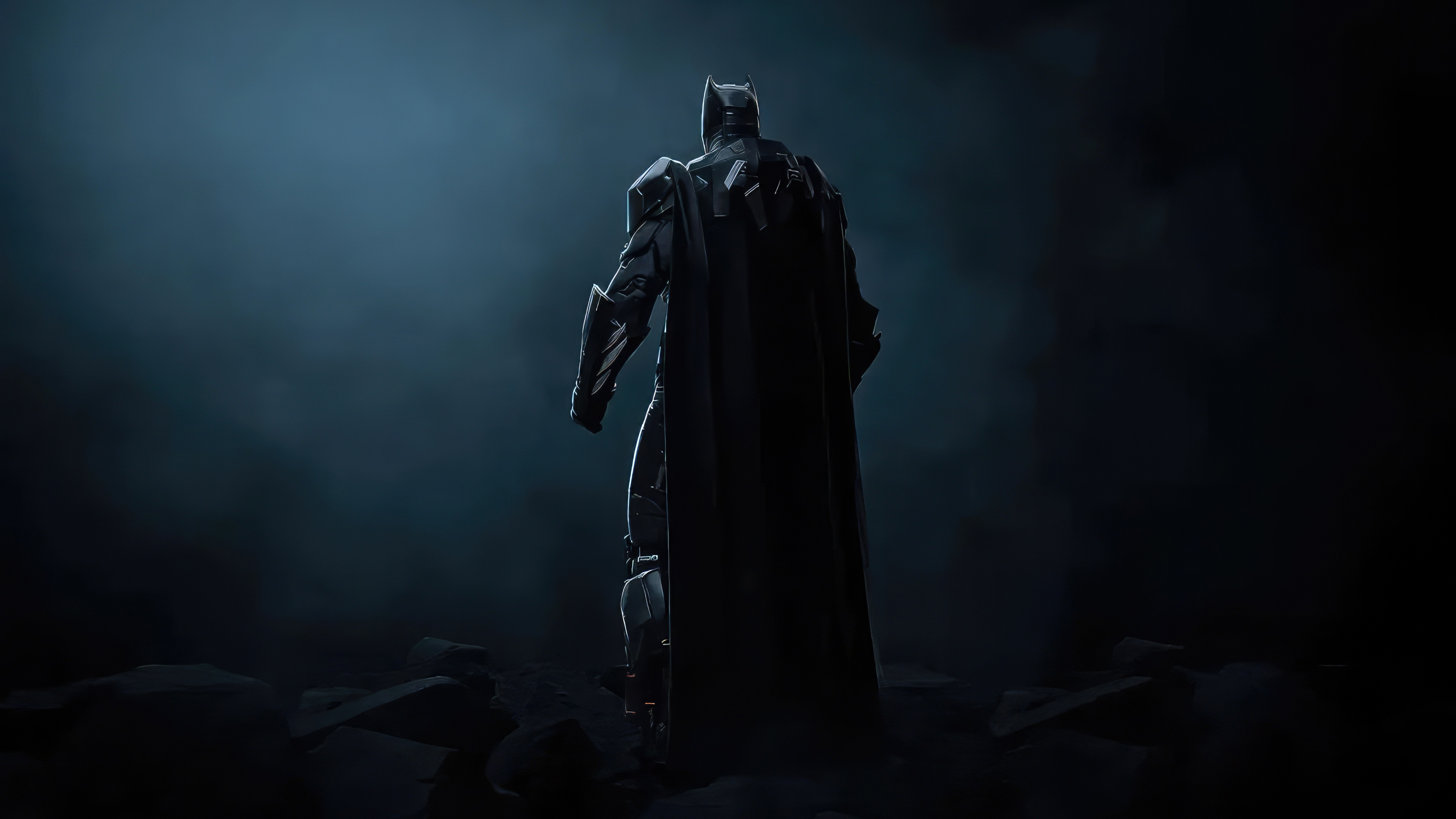 Batman standing in a dark, smoky environment HD Wallpaper