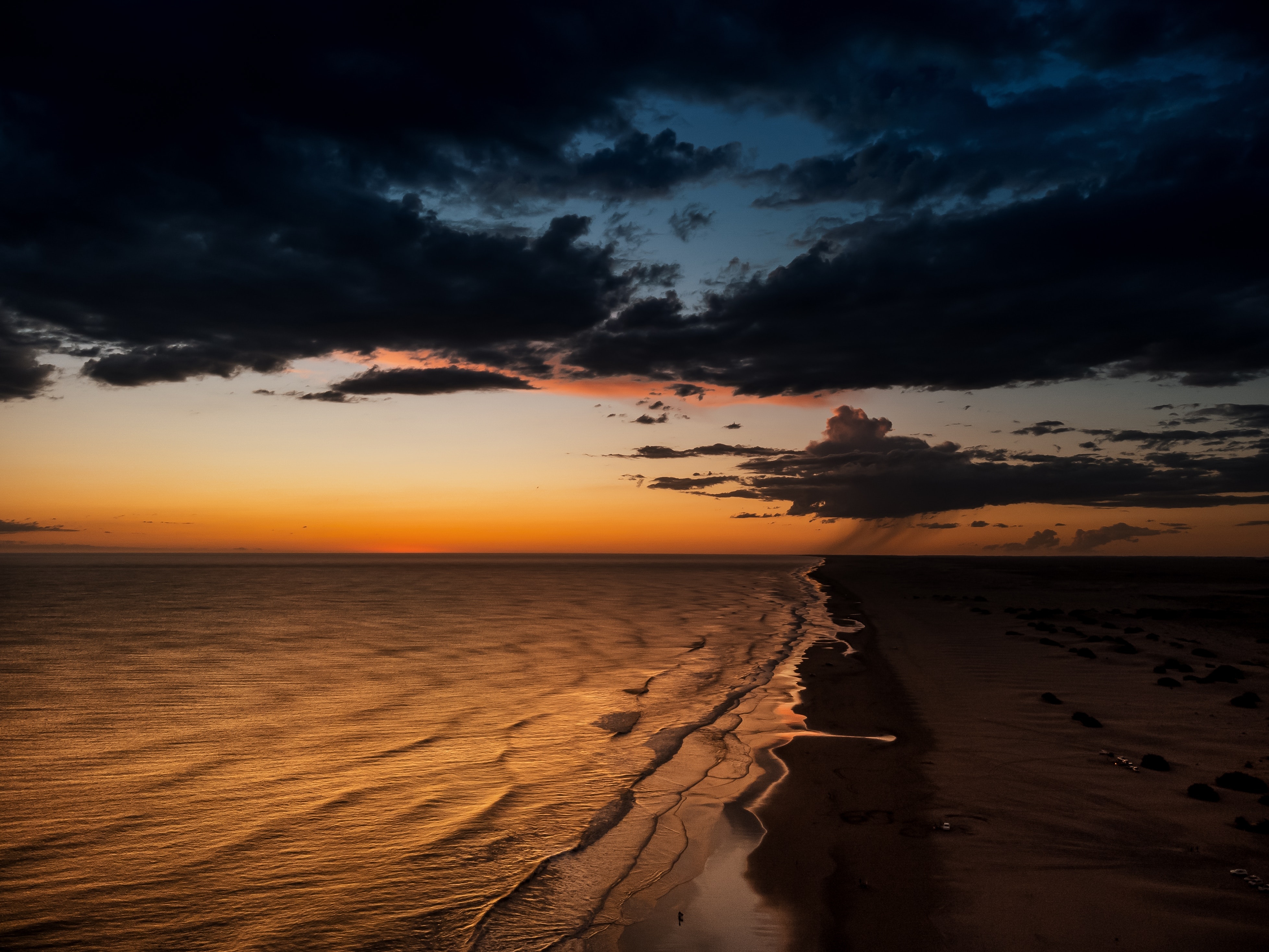 Sunset over ocean on a beach HD Wallpaper