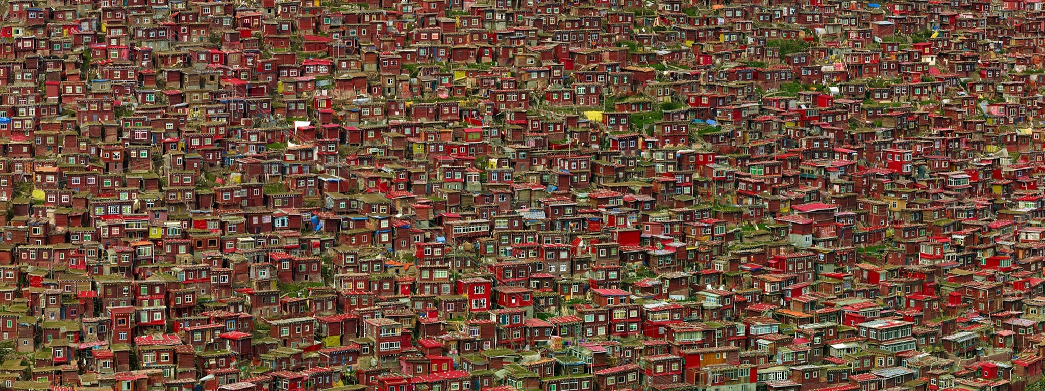 Vast Tibetan Buddhist Monastery with Red Buildings HD Wallpaper