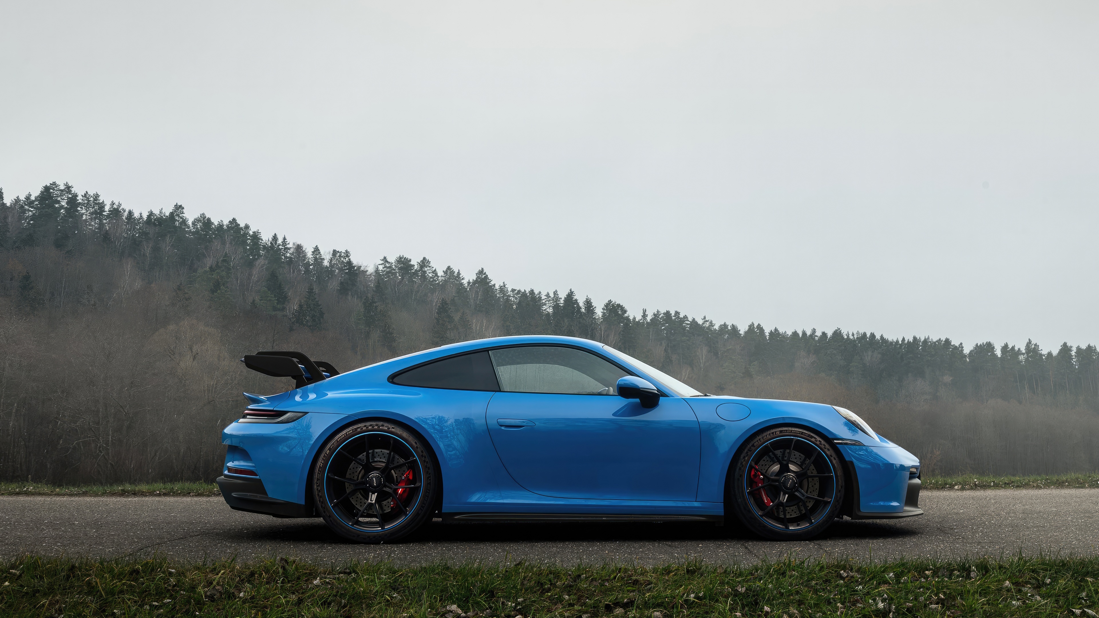 Blue Porsche 911 GT3 RS parked on a road HD Wallpaper
