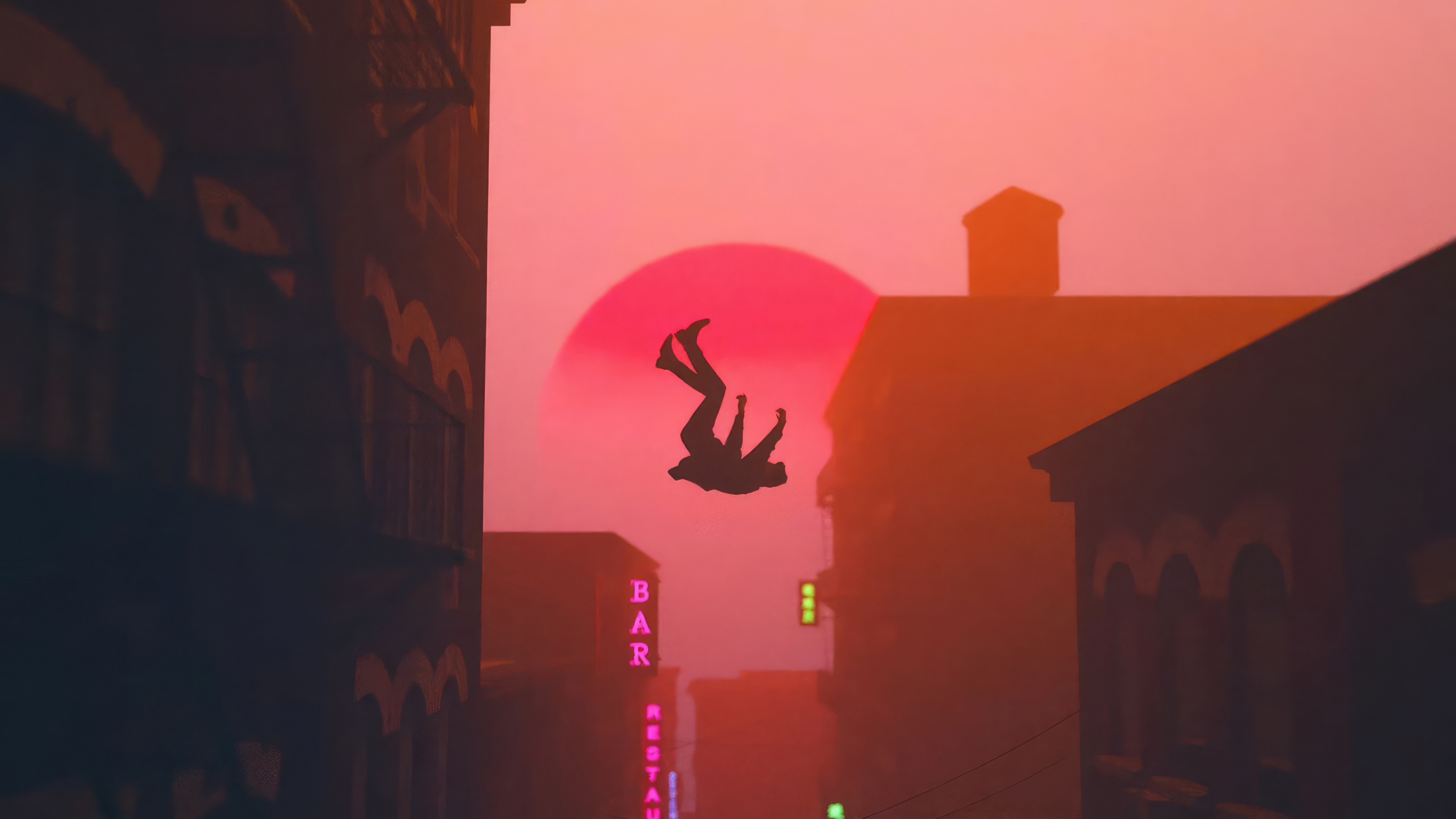 Silhouette of a person falling against a sunset HD Wallpaper