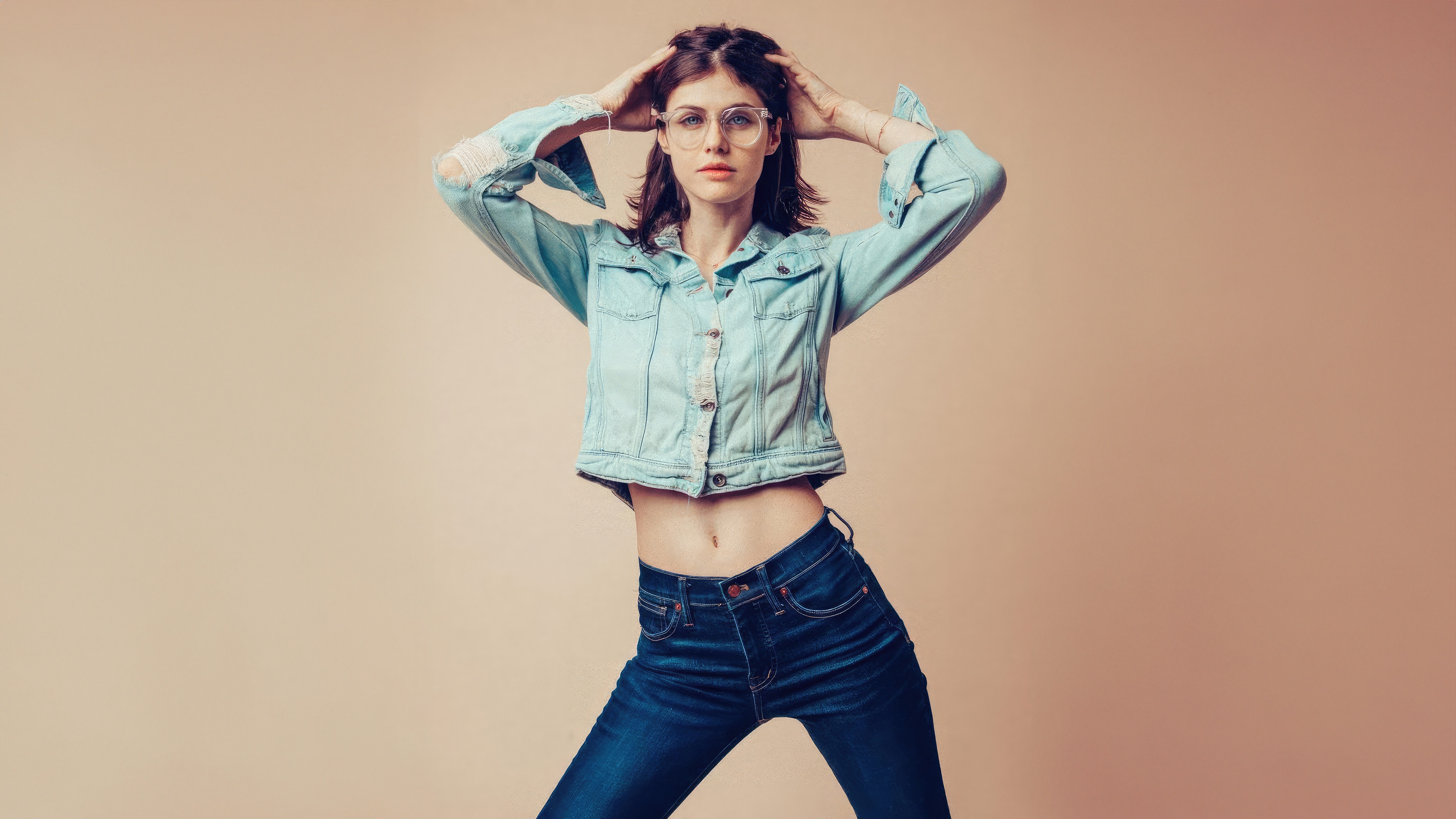 Alexandra Daddario in a denim jacket and jeans HD Wallpaper