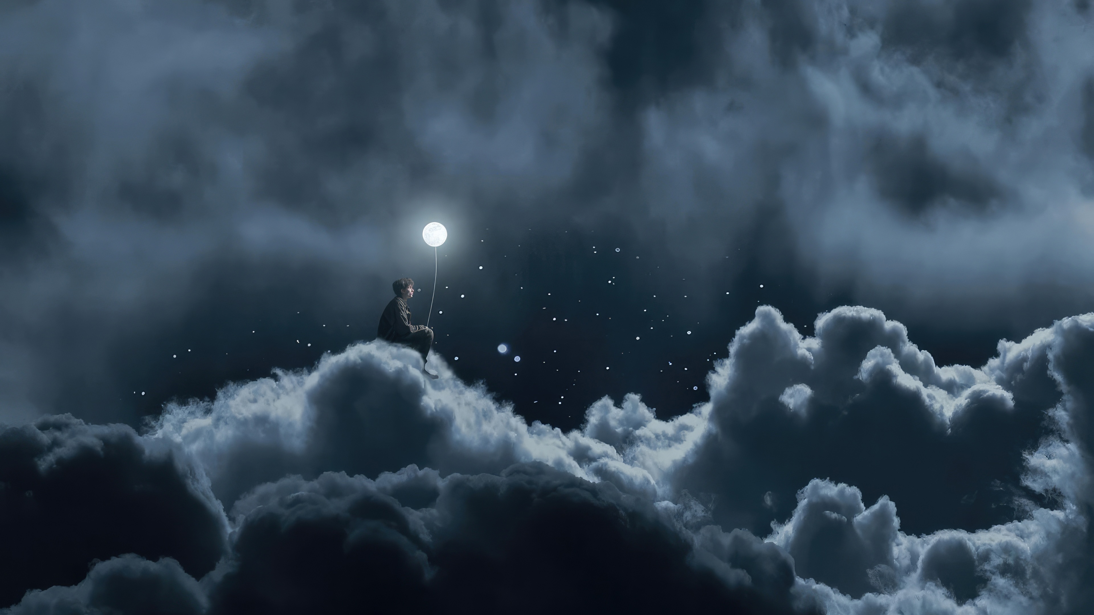 Boy holding moon balloon sitting on clouds HD Wallpaper