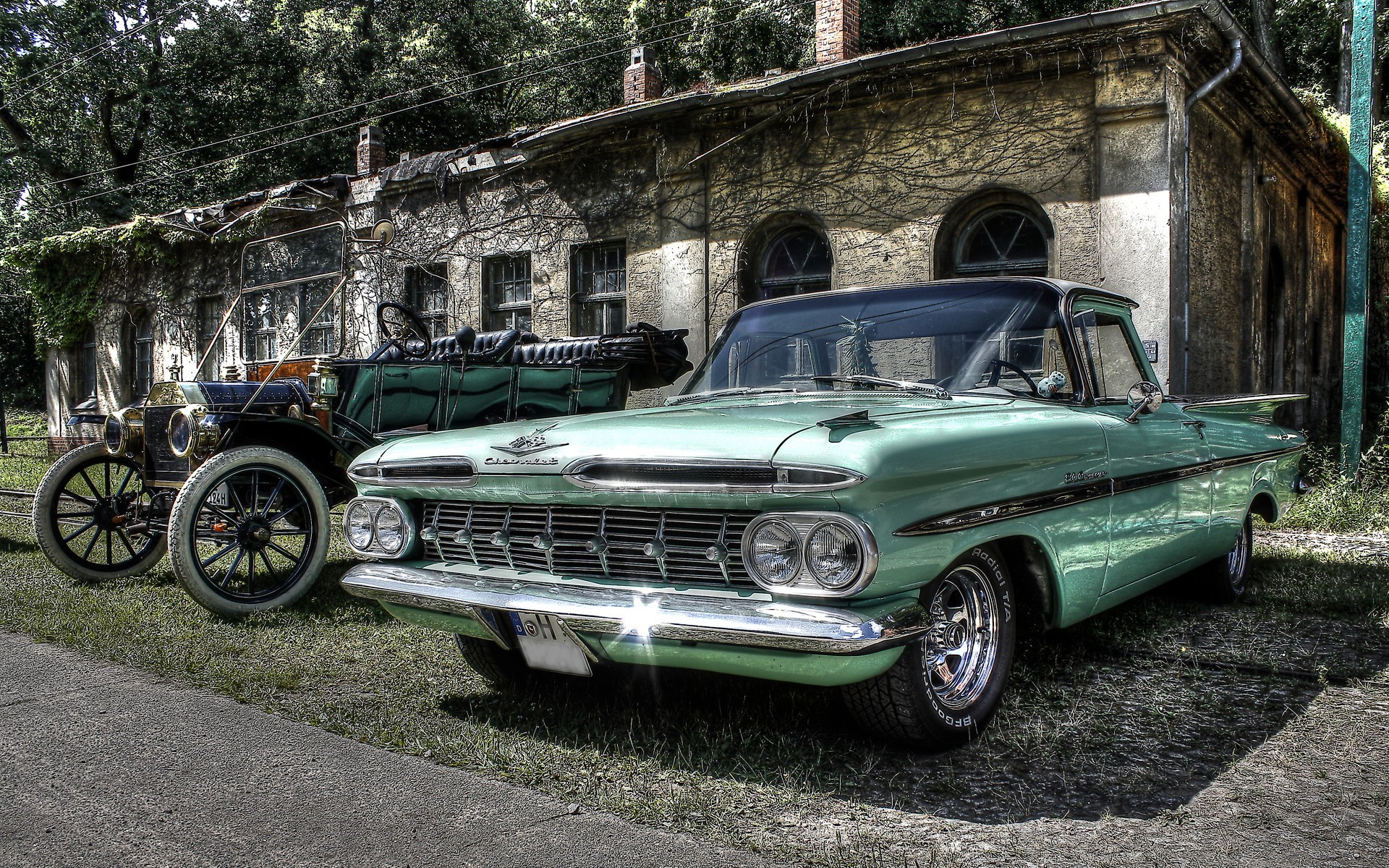 Chevrolet Bel Air and vintage car in front of building HD Wallpaper