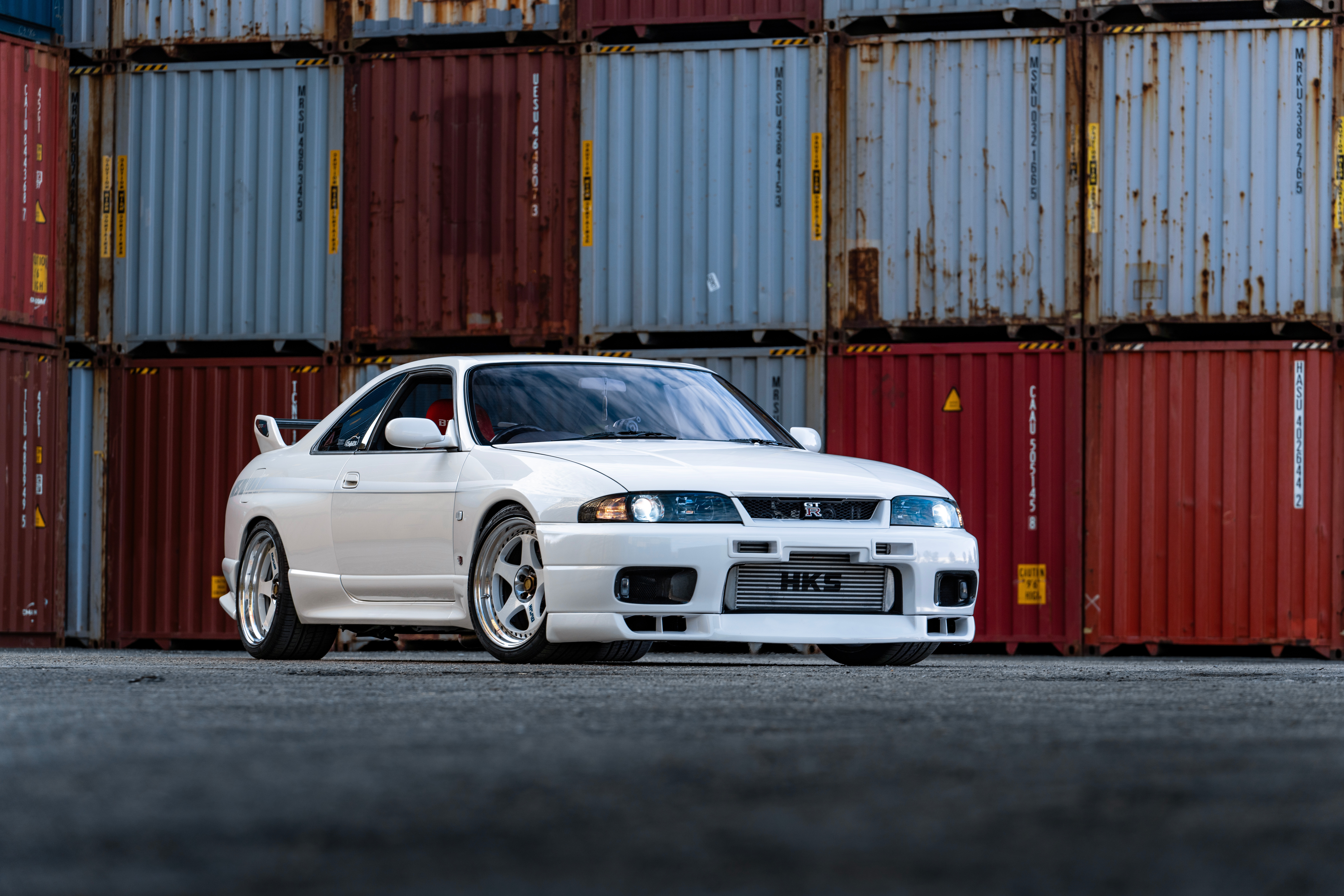 White Nissan R33 GTR Vspec parked HD Wallpaper
