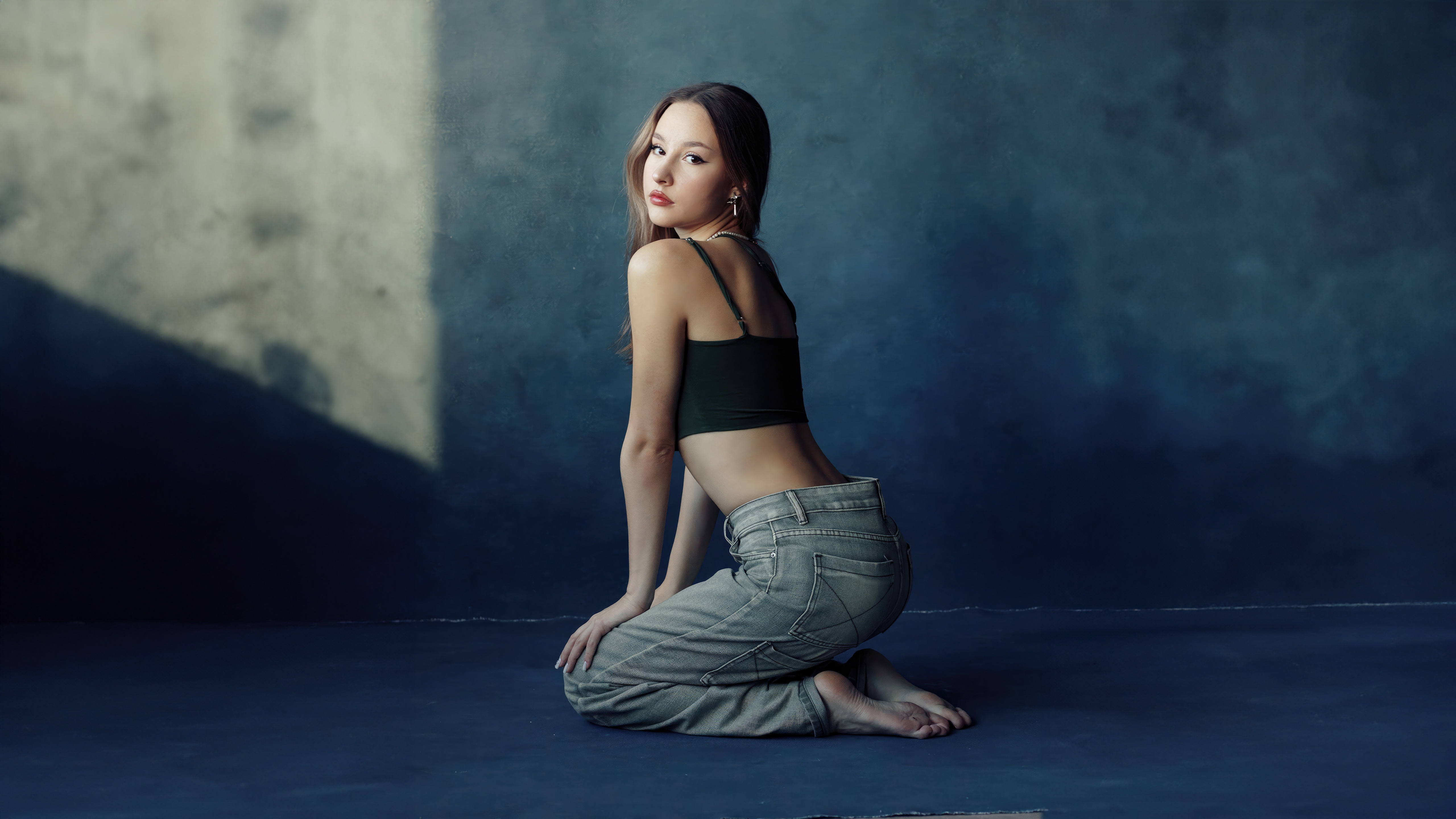 Girl Poses In Jeans Gazing Back HD Wallpaper
