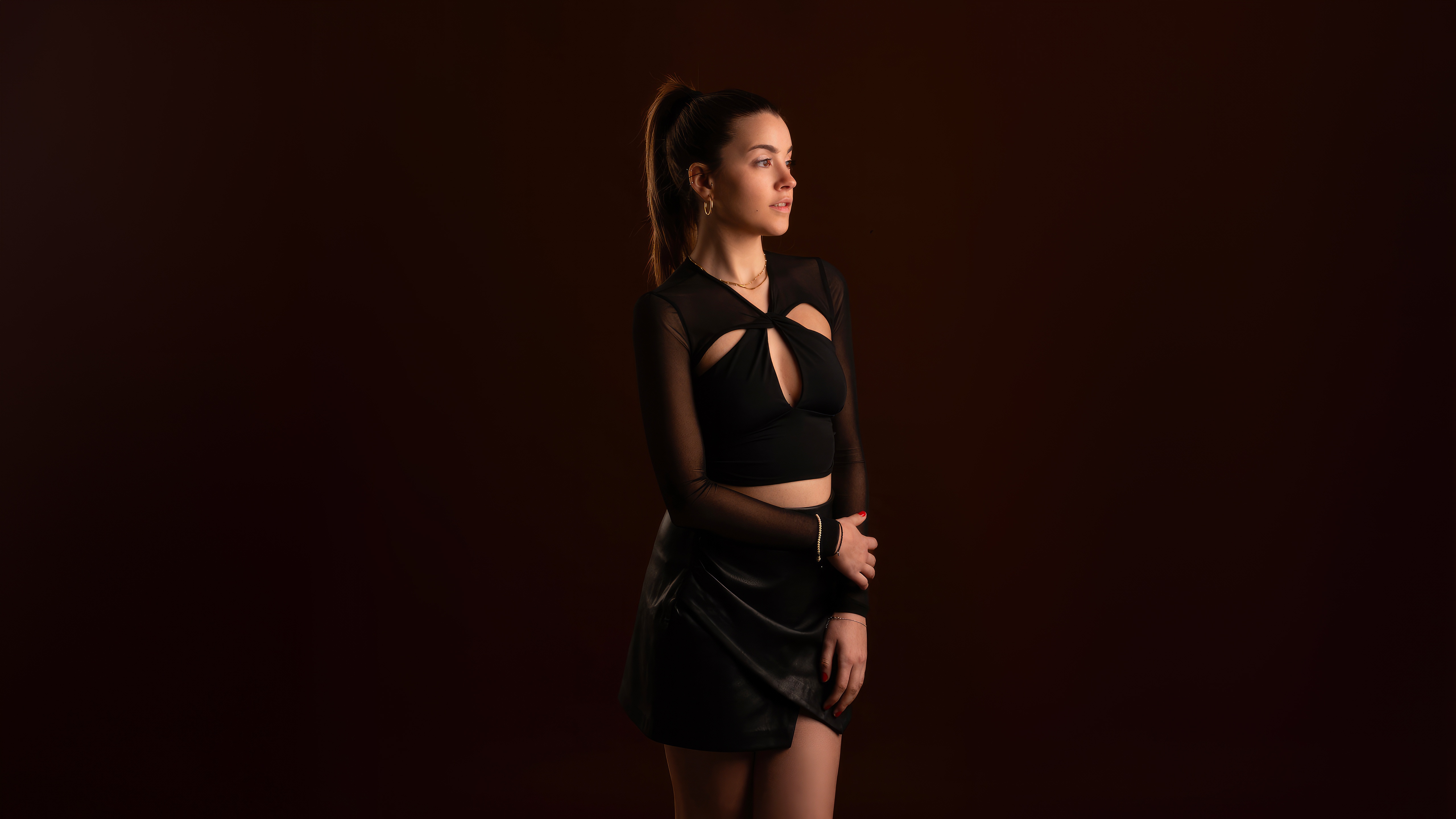 Girl in black outfit with cutout top HD Wallpaper
