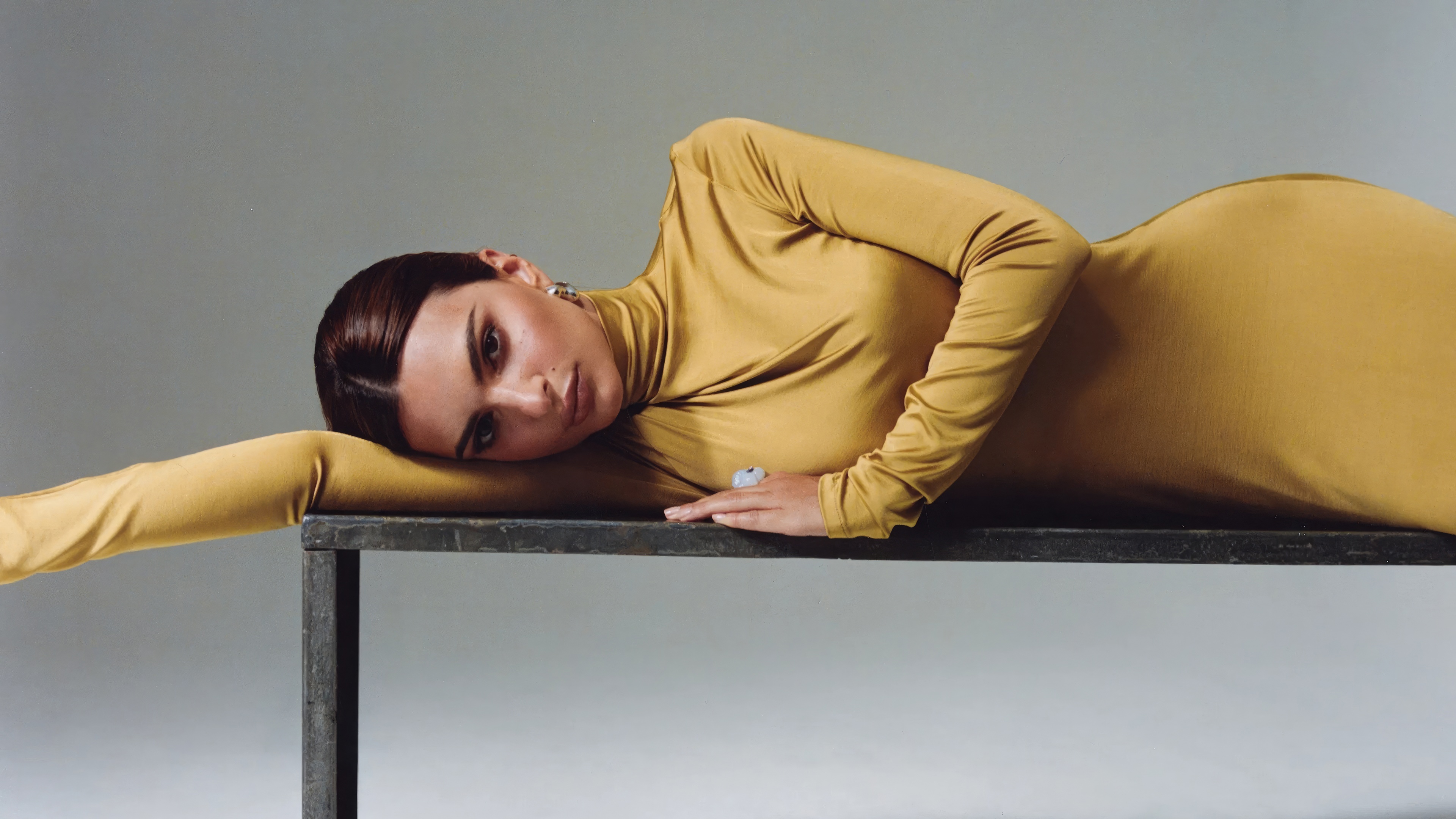 Emily Ratajkowski in Yellow Dress on Metal Bench HD Wallpaper