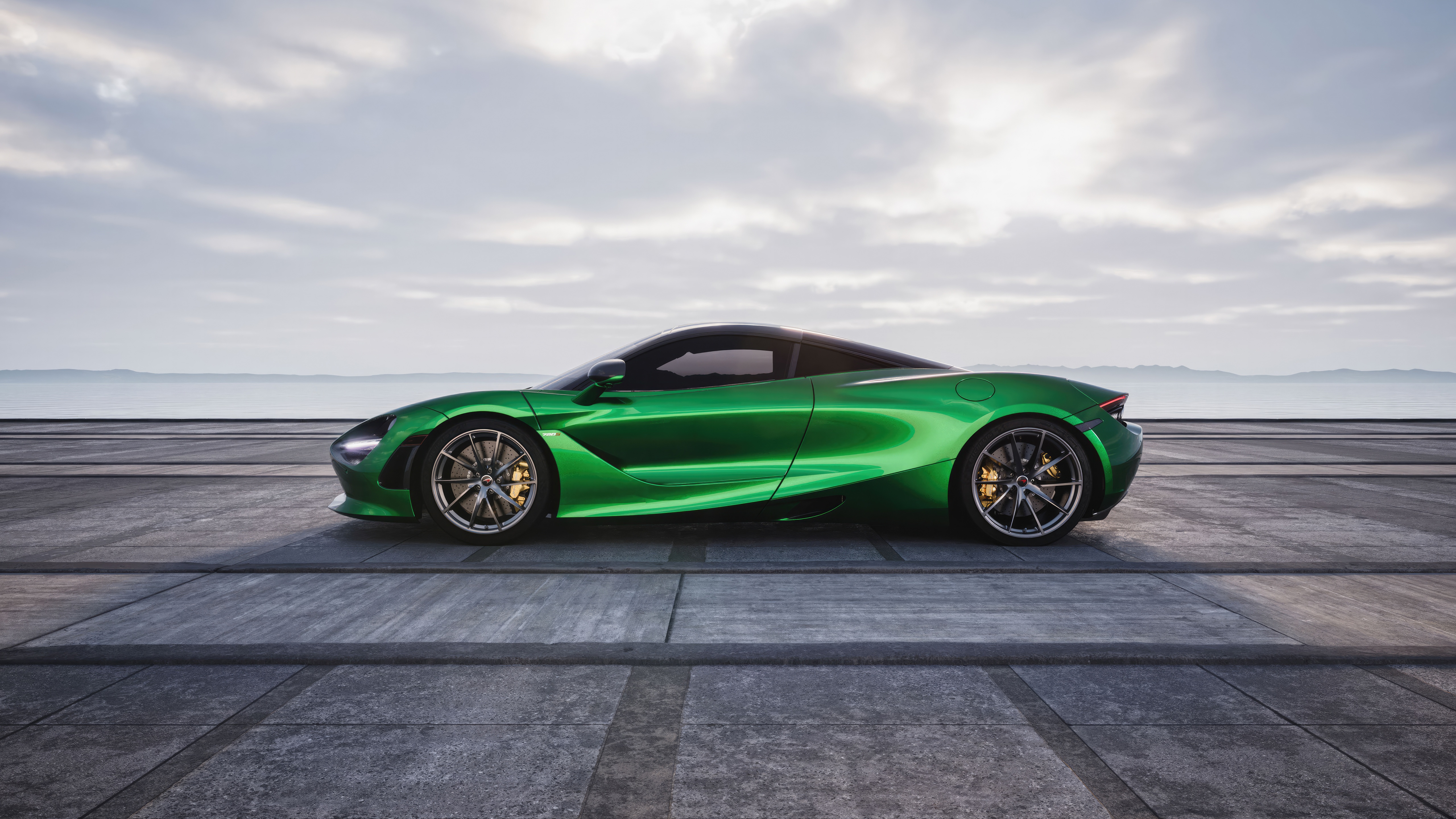 Green McLaren 720s parked on a concrete surface HD Wallpaper