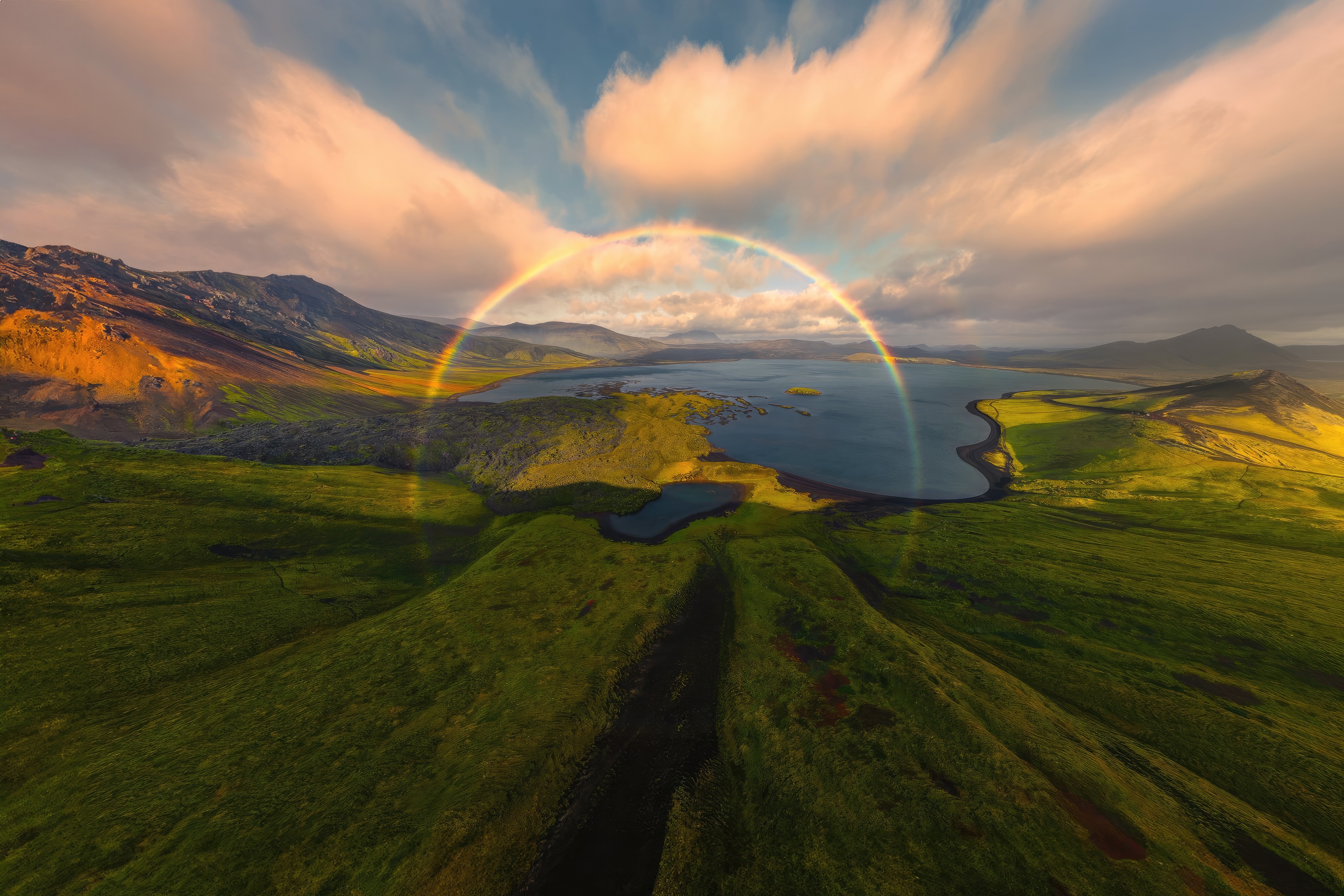 Rainbow over a lake in Iceland HD Wallpaper