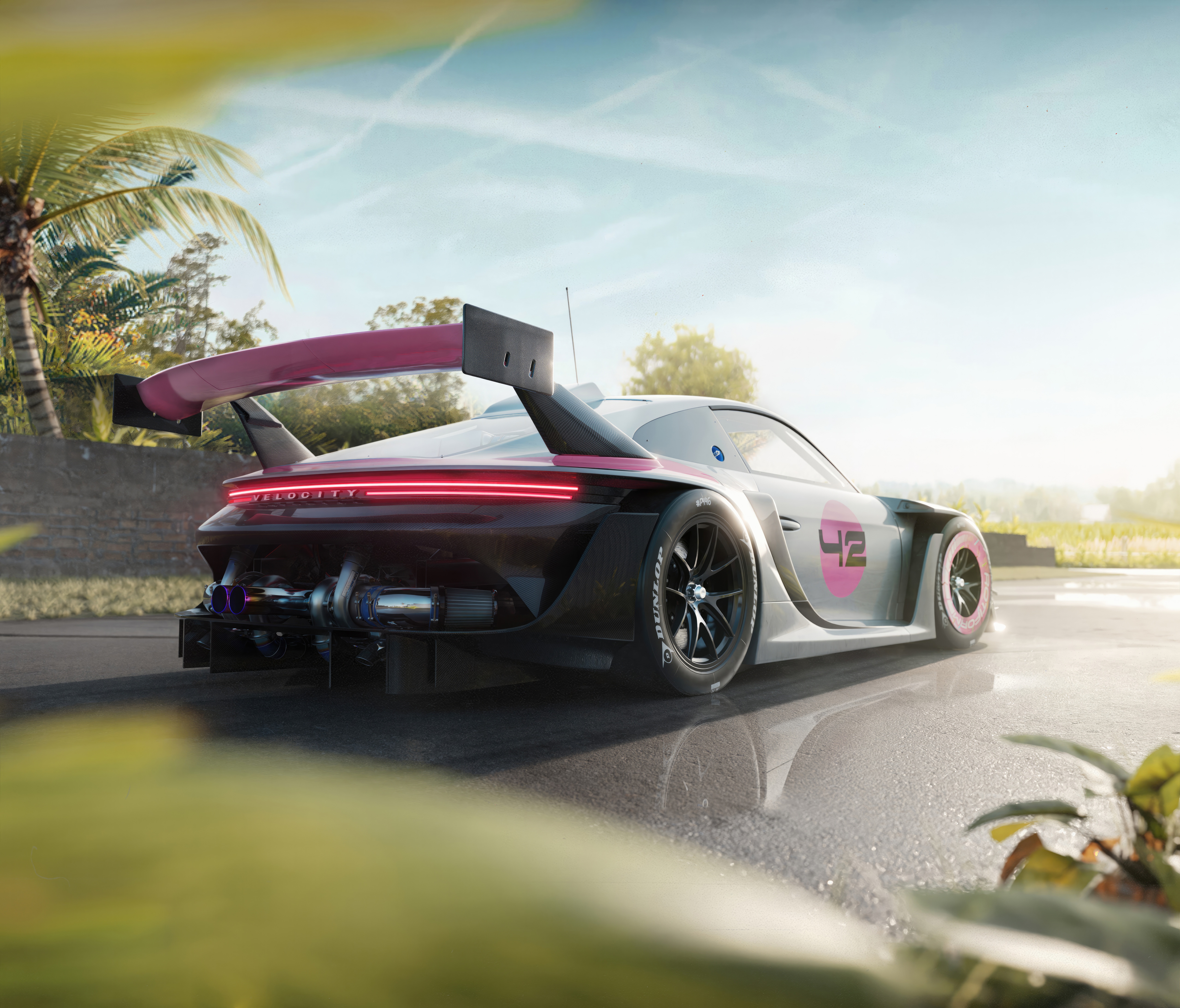 Porsche 935 race car with pink accents HD Wallpaper