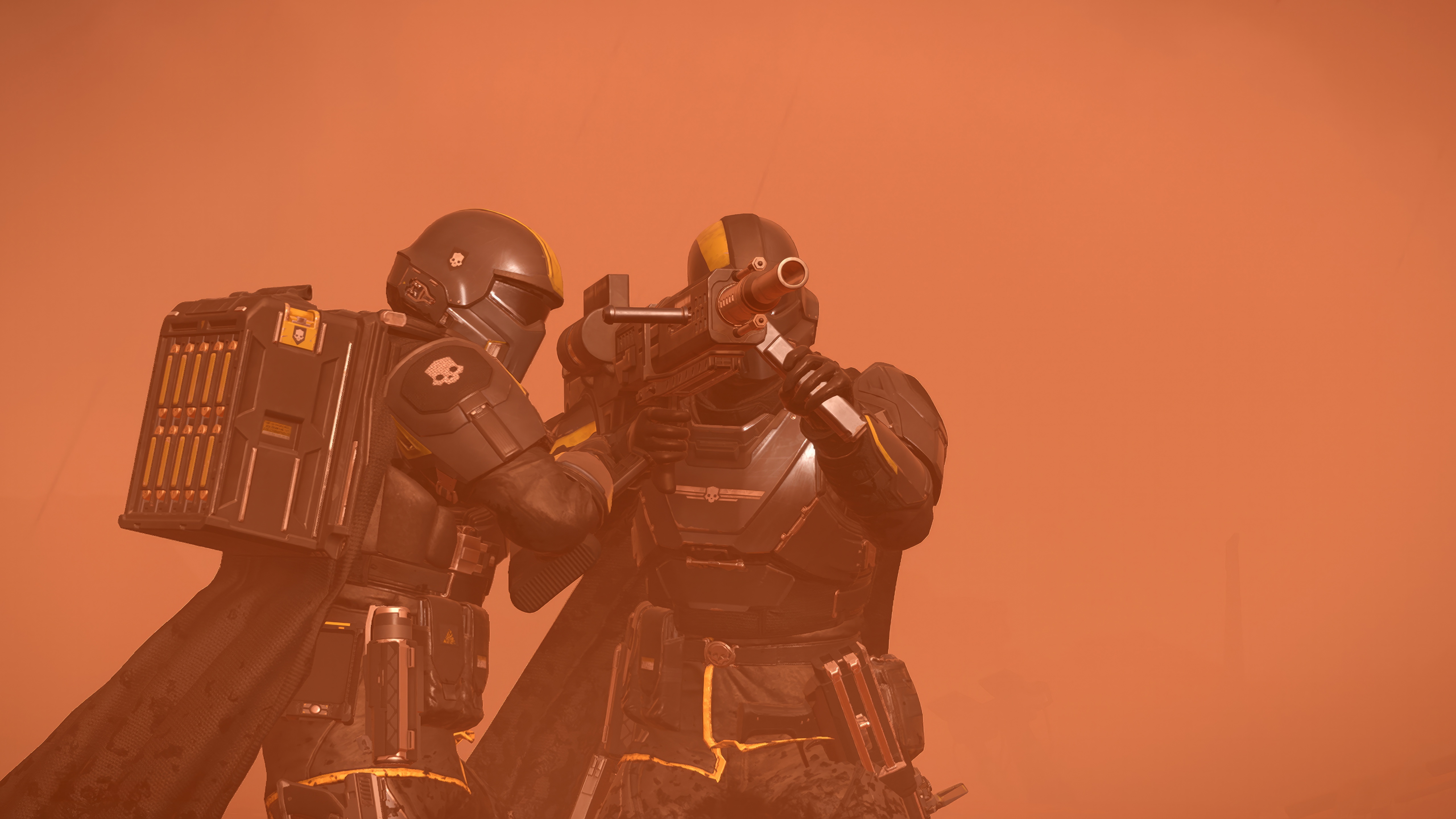 Helldivers 2 soldiers aiming weapons on a dusty planet HD Wallpaper