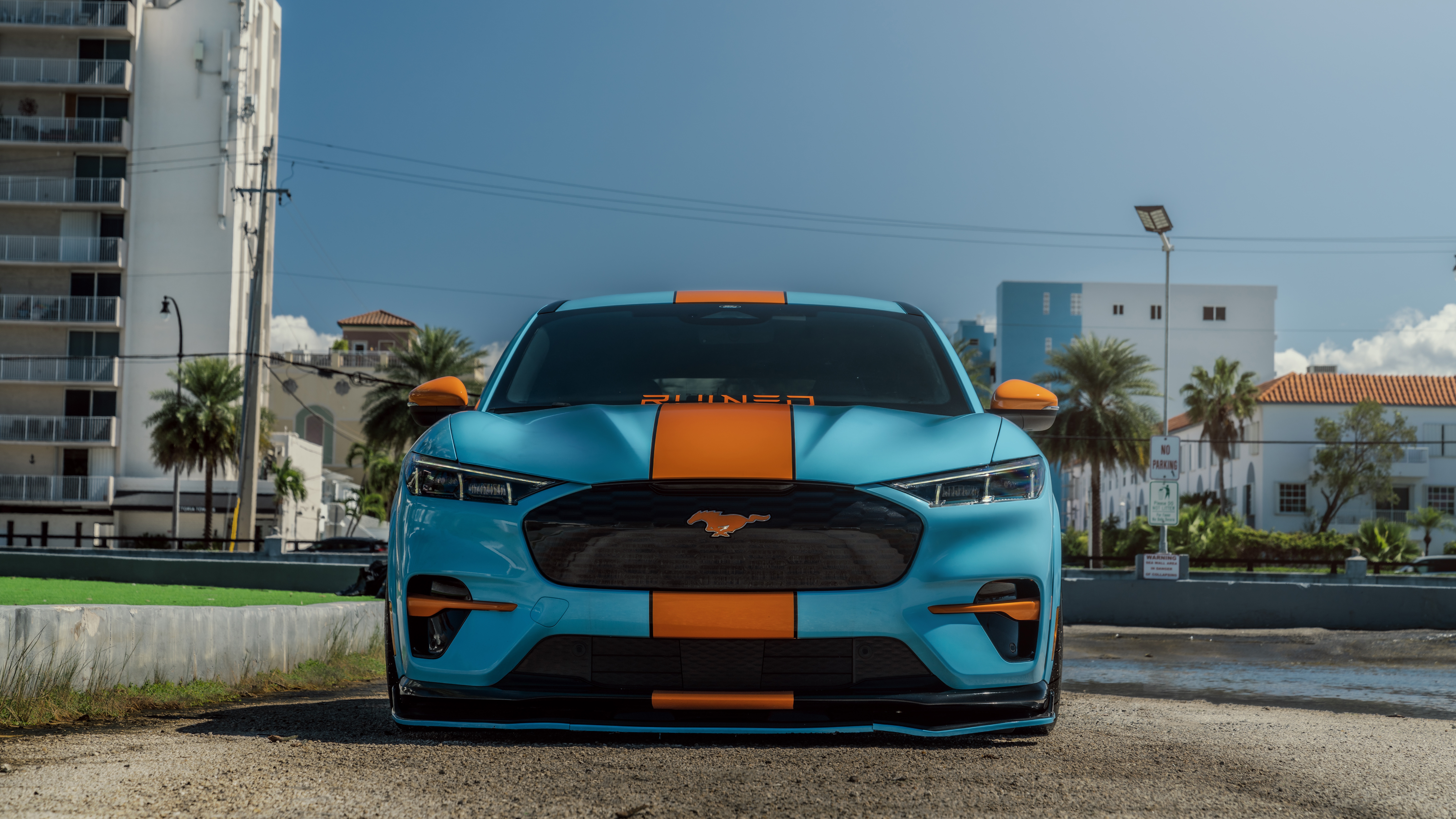 Blue and orange Ford Mustang Mach-E with racing stripes HD Wallpaper