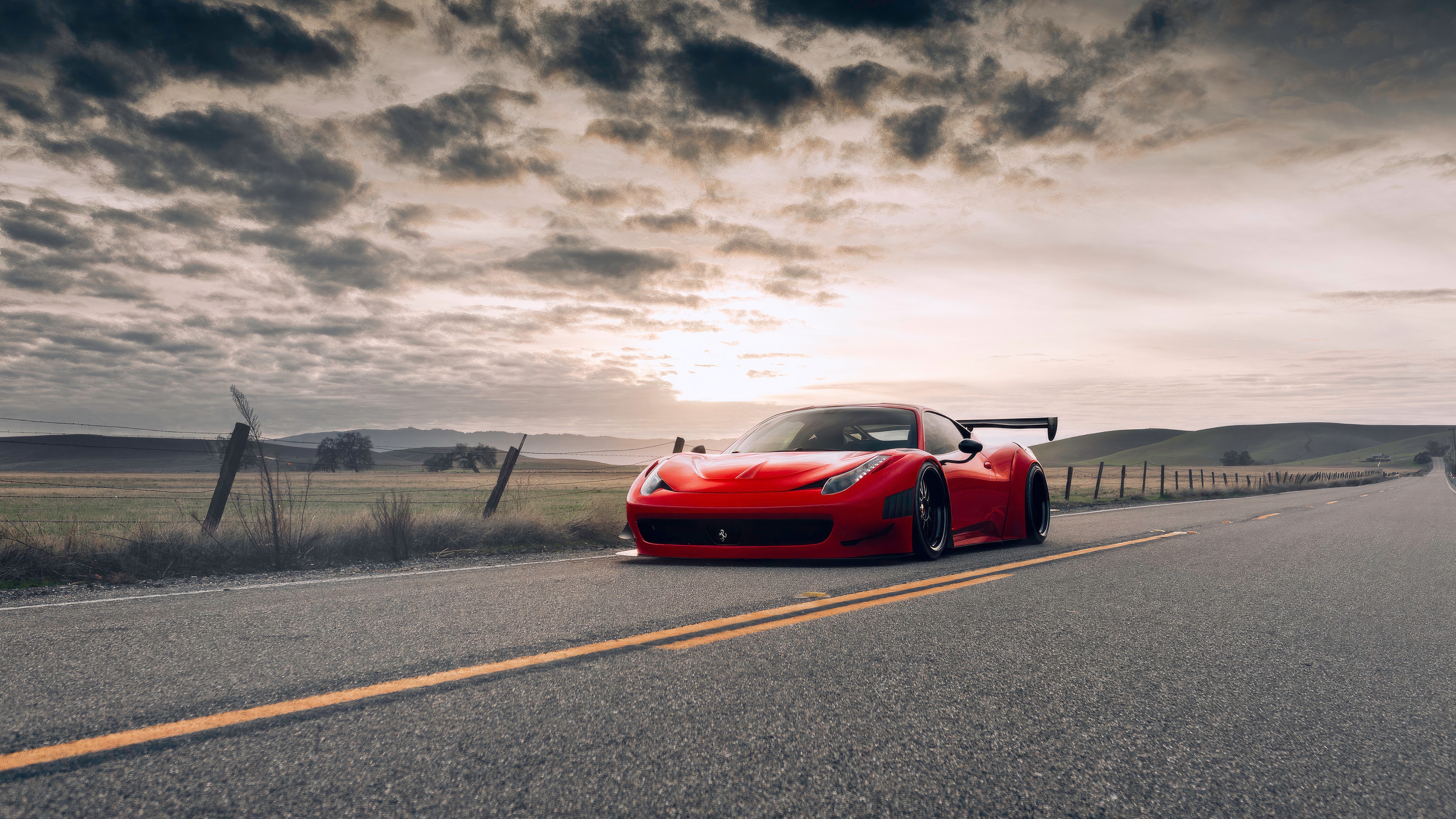 Red Ferrari car on a rural road HD Wallpaper