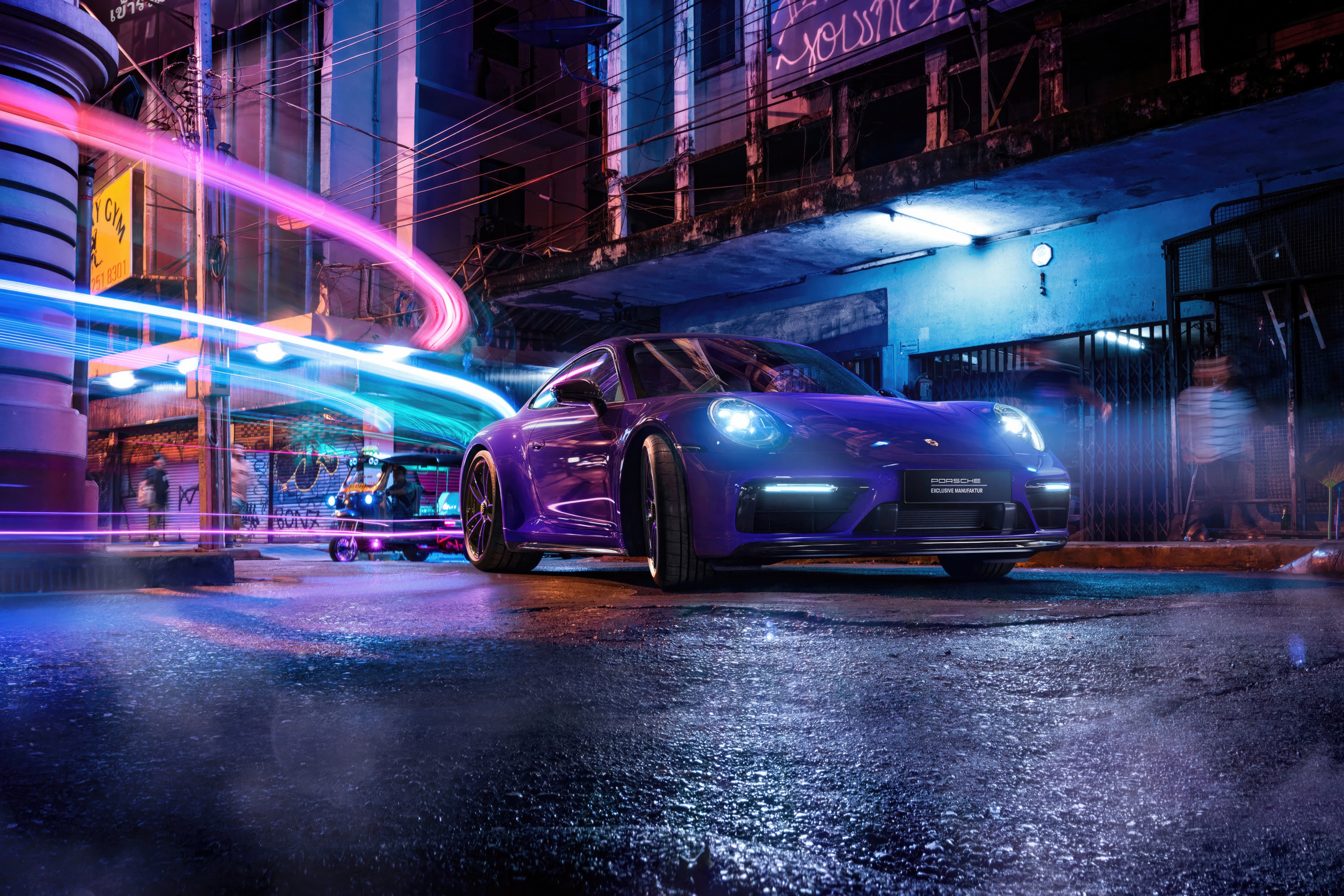 Purple Porsche on a wet city street at night HD Wallpaper