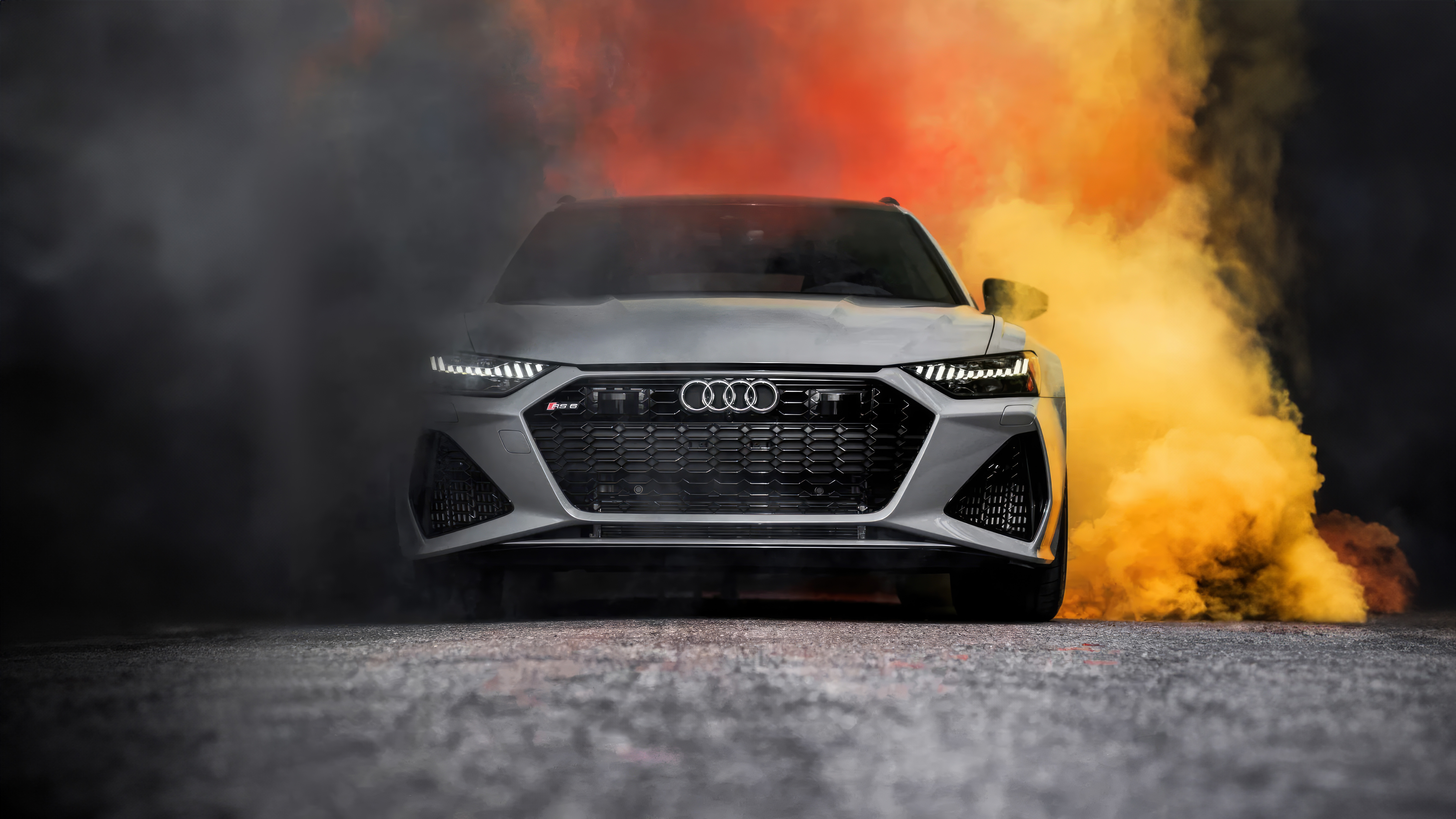 Audi RS6 Avant surrounded by colorful smoke HD Wallpaper