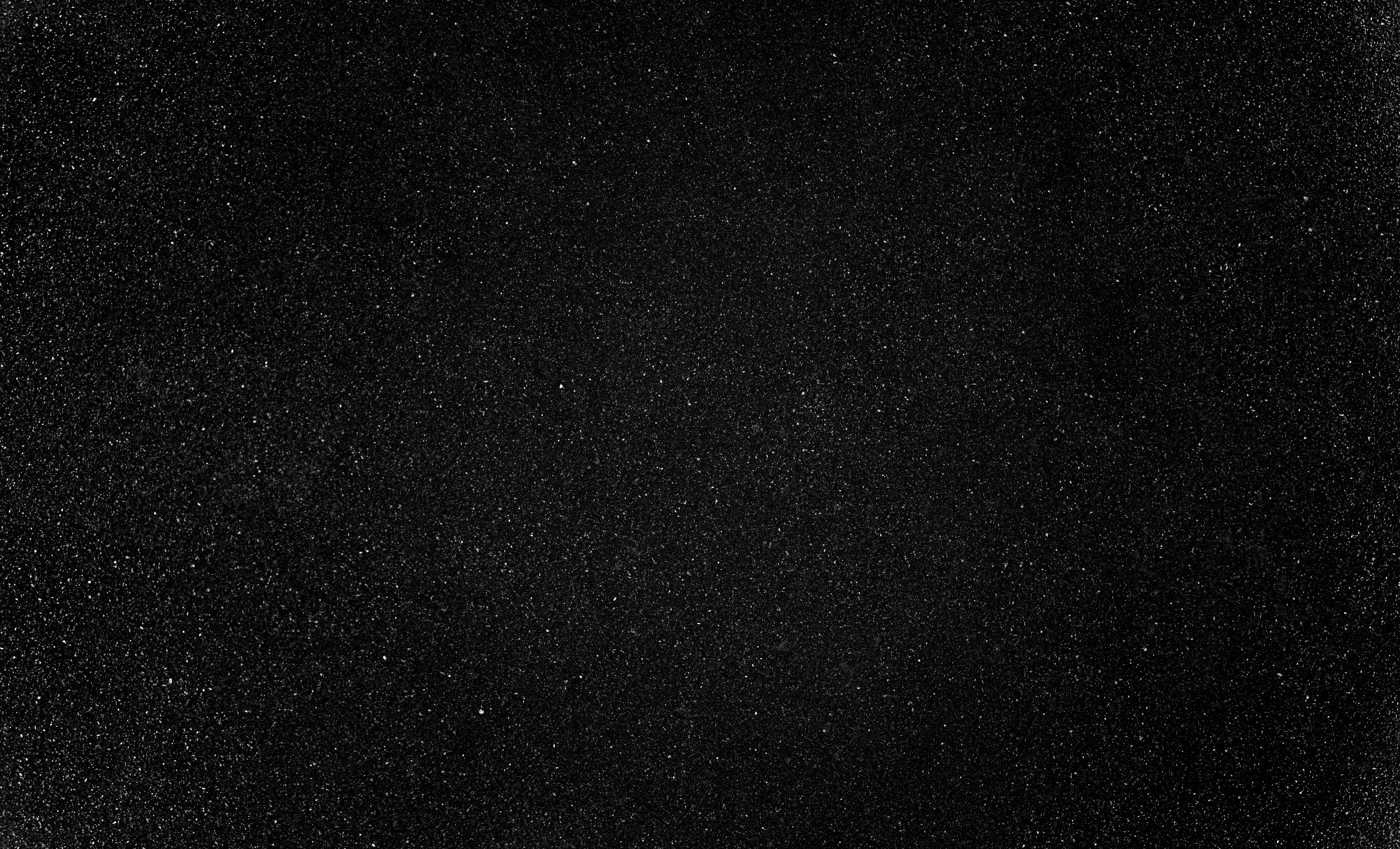 Black textile with glitter on a black background HD Wallpaper
