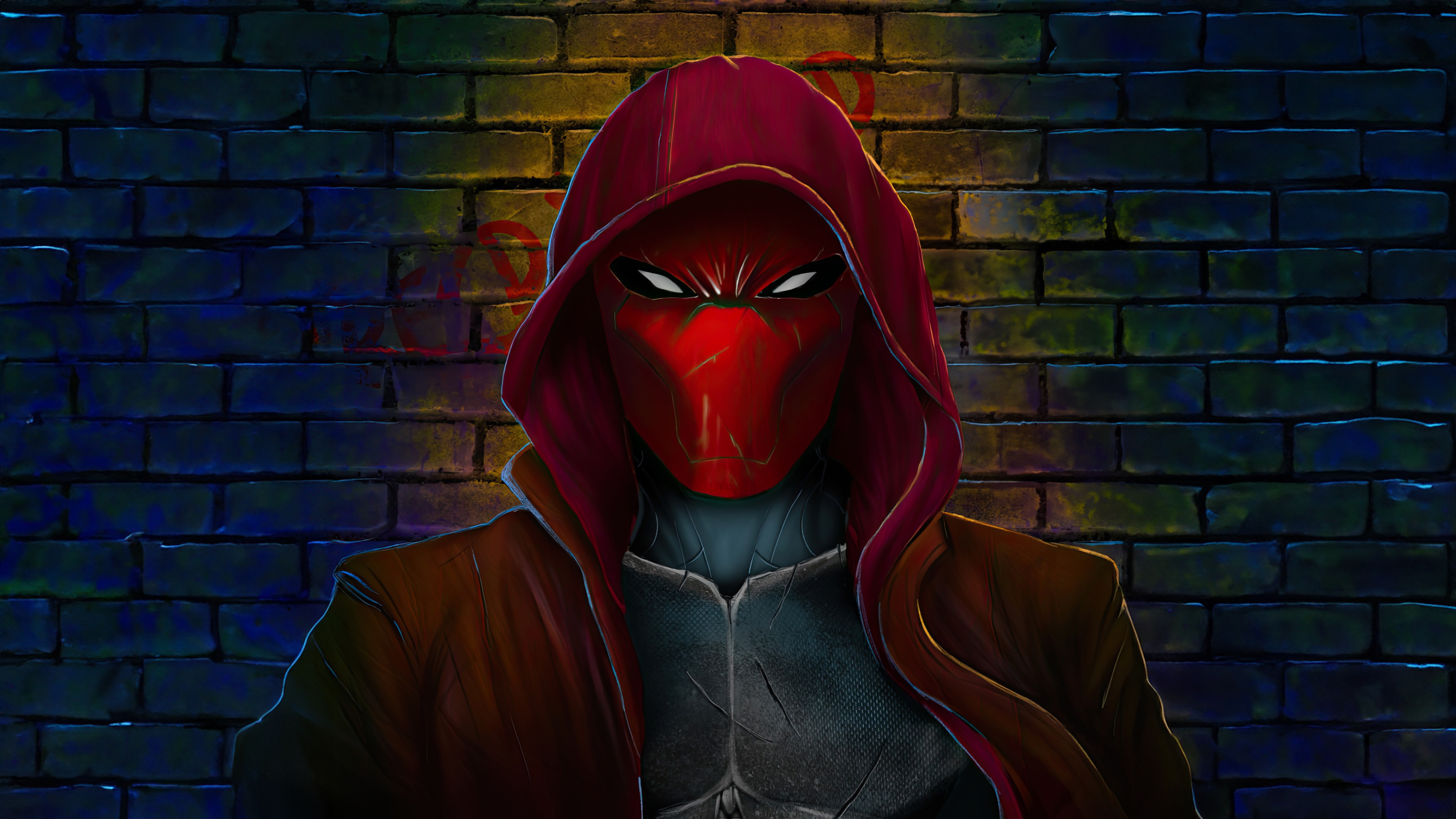 Red Hood in front of a brick wall HD Wallpaper