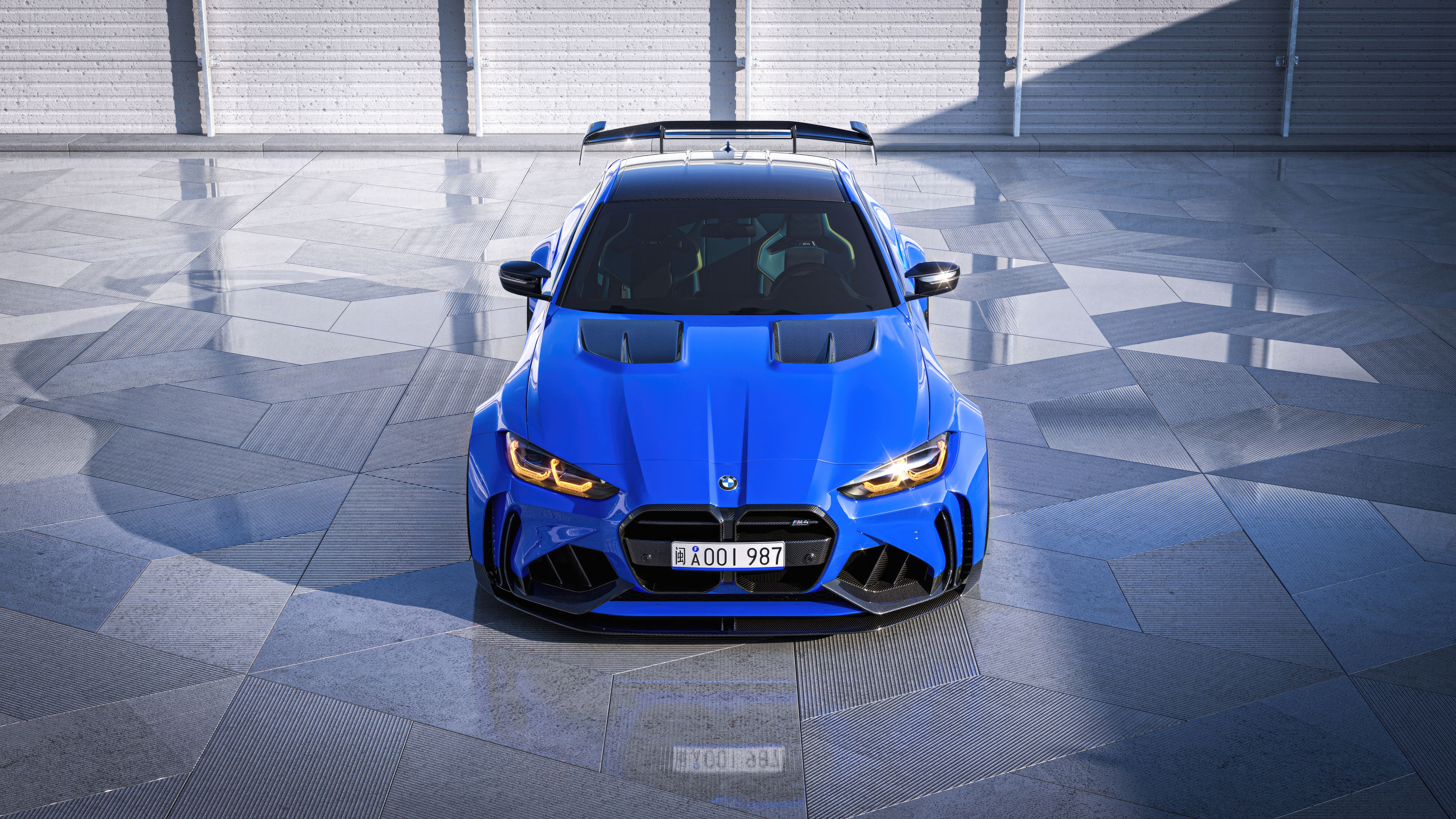 Blue BMW M4 Coupe with Spoiler HD Wallpaper
