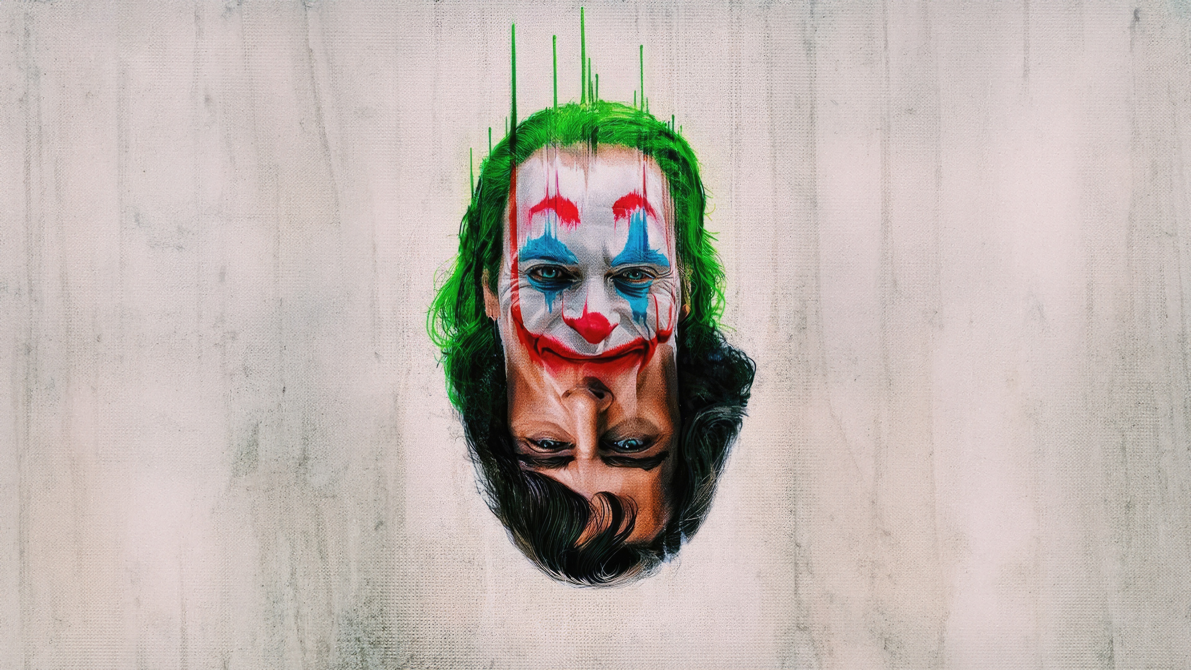 Joker's dual nature depicted in artwork HD Wallpaper