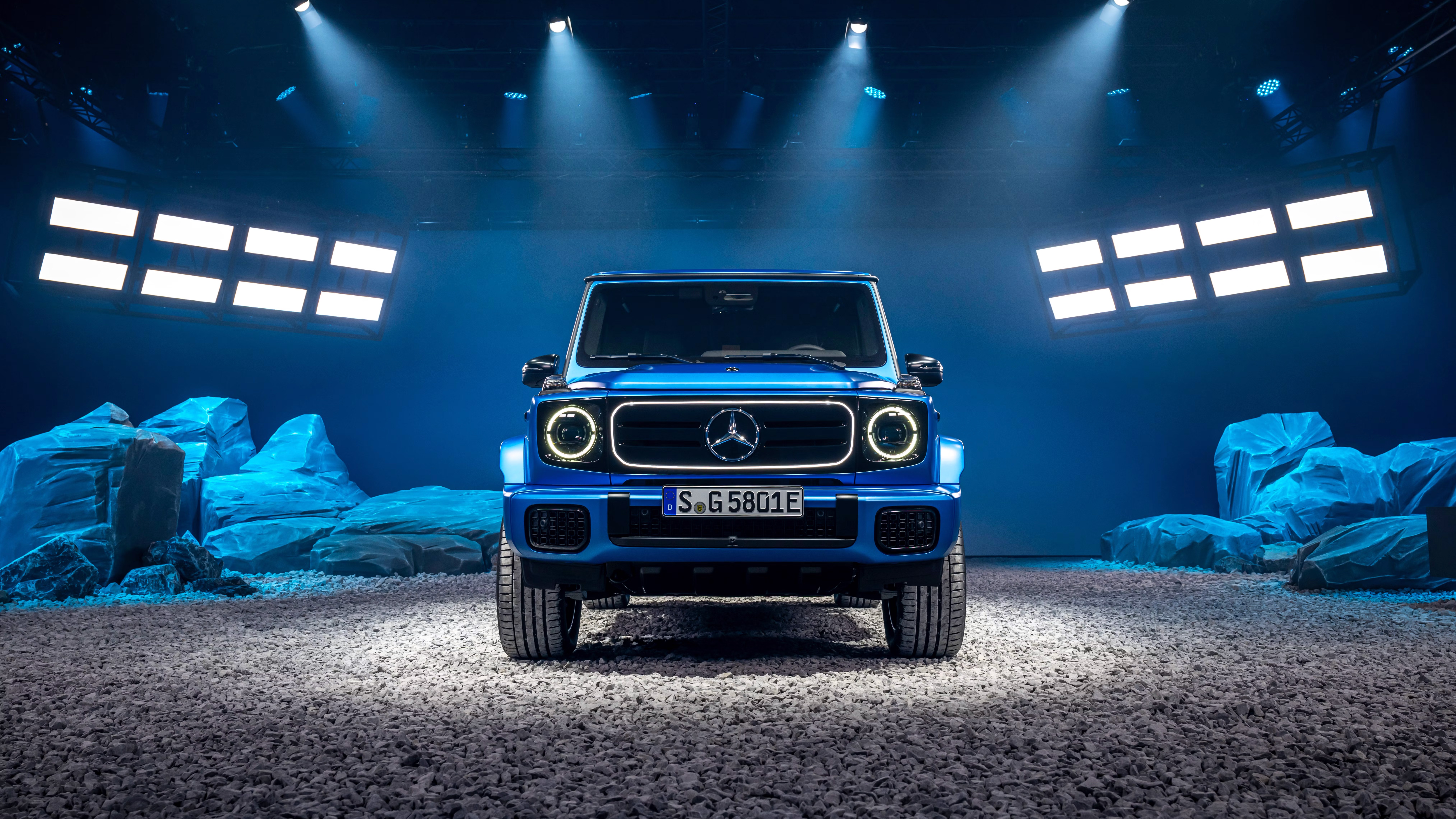 Blue Mercedes-Benz G 580 EQG on a rocky set HD Wallpaper