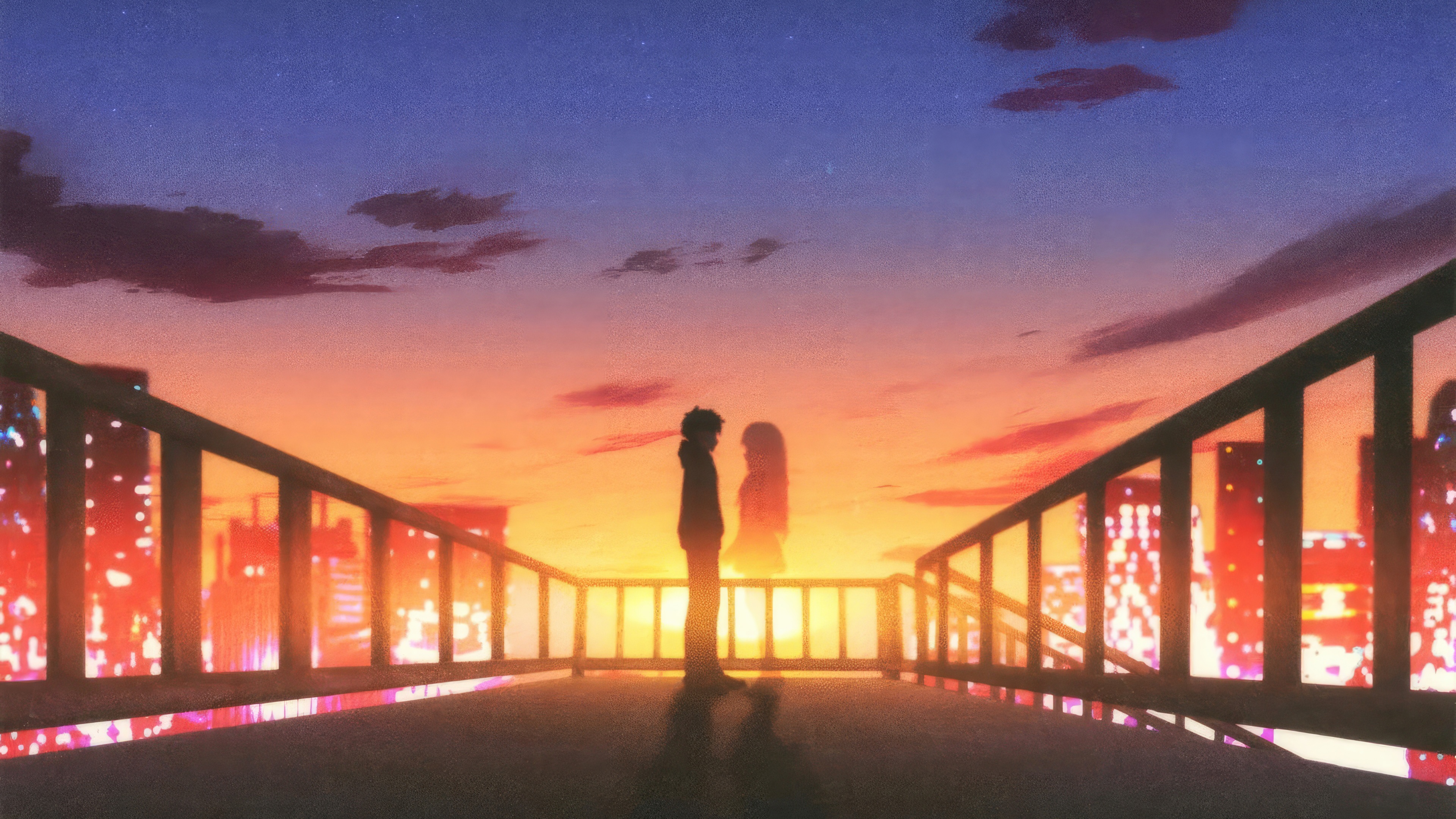 Couple Silhouetted Against a Sunset Over City HD Wallpaper
