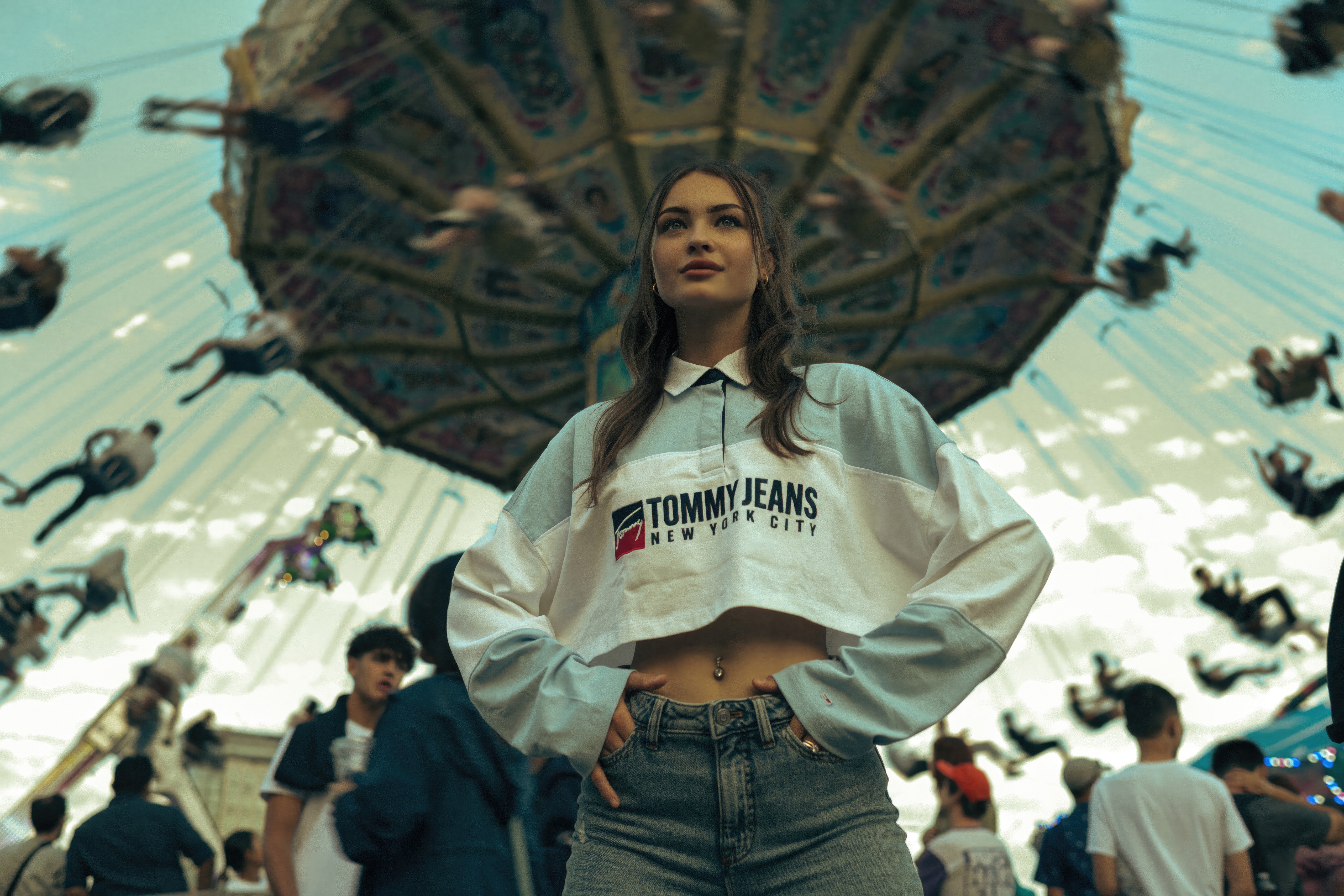Girl in Tommy Jeans at a Carnival HD Wallpaper
