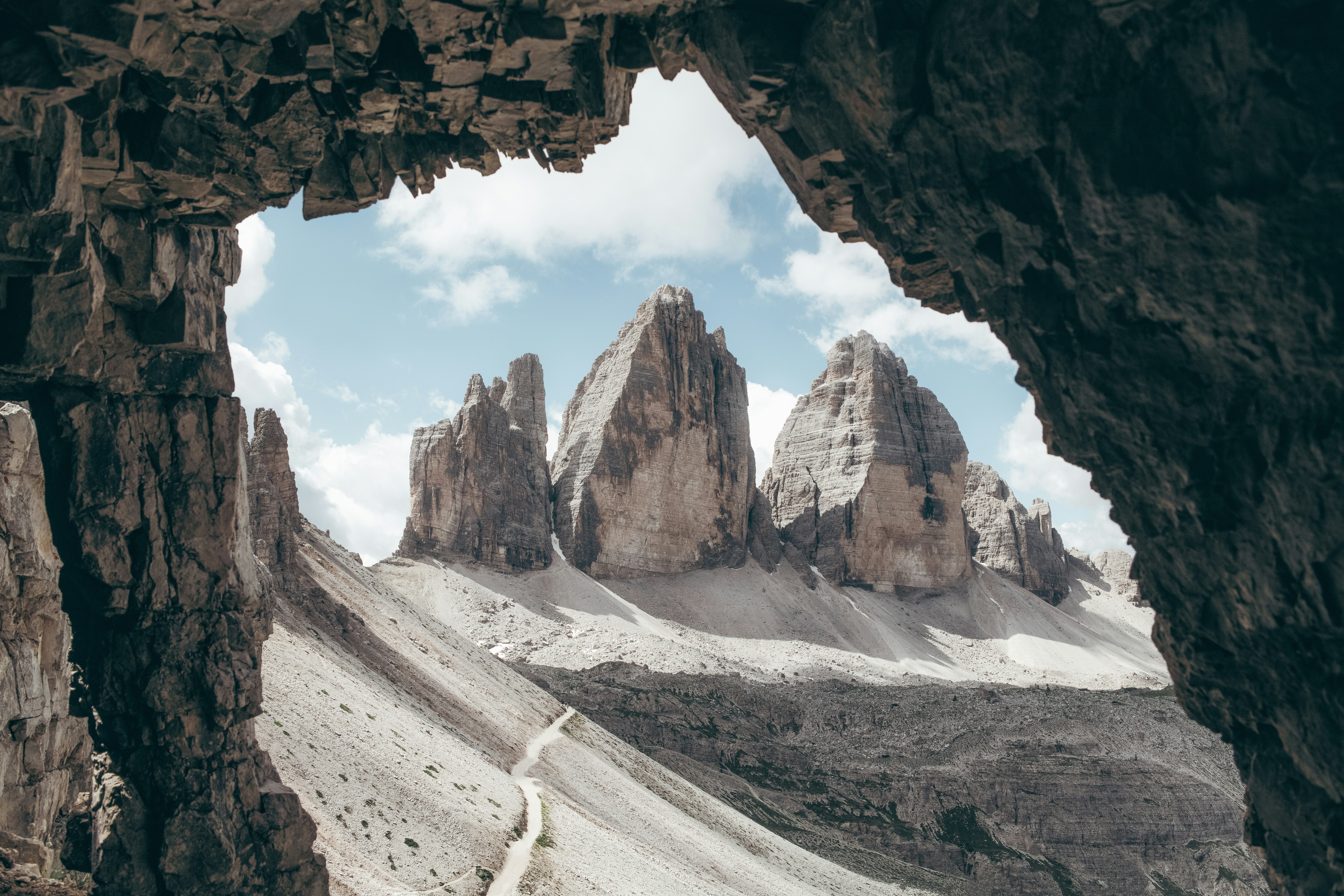 Mountain Range Through Cave Entrance HD Wallpaper