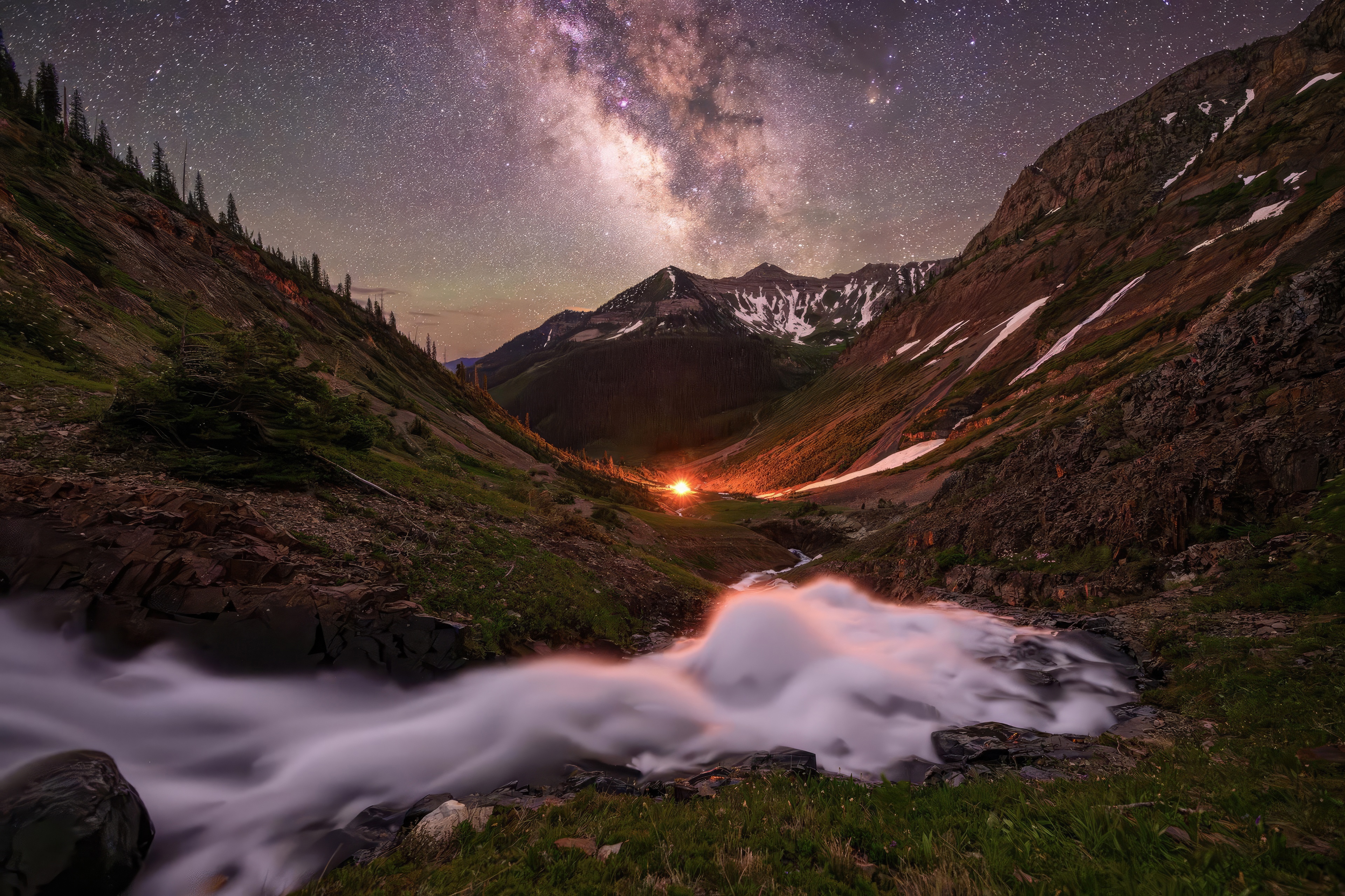 Milky Way over a mountain valley with a campfire HD Wallpaper