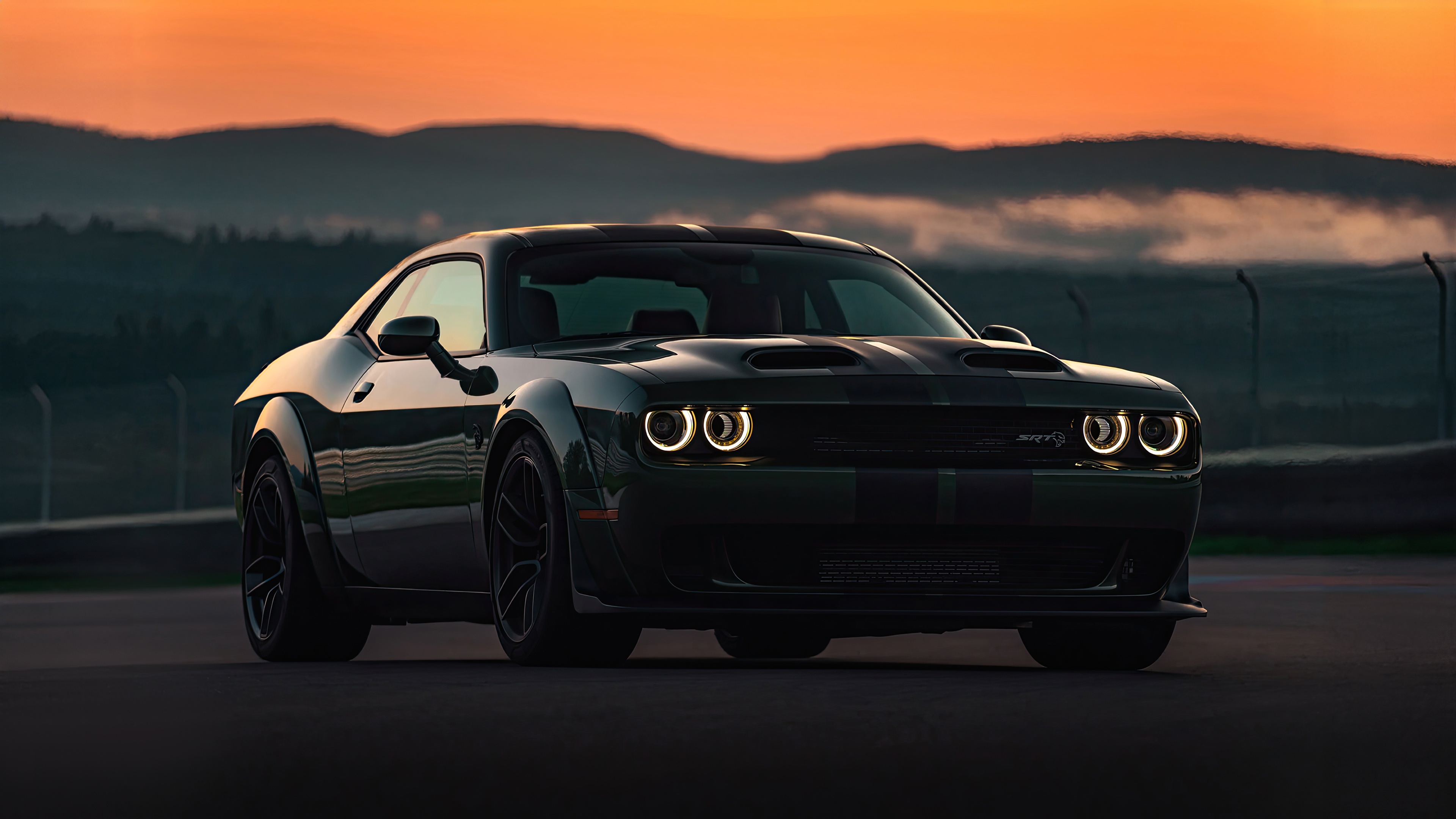2024 Dodge Challenger SRT on a race track HD Wallpaper