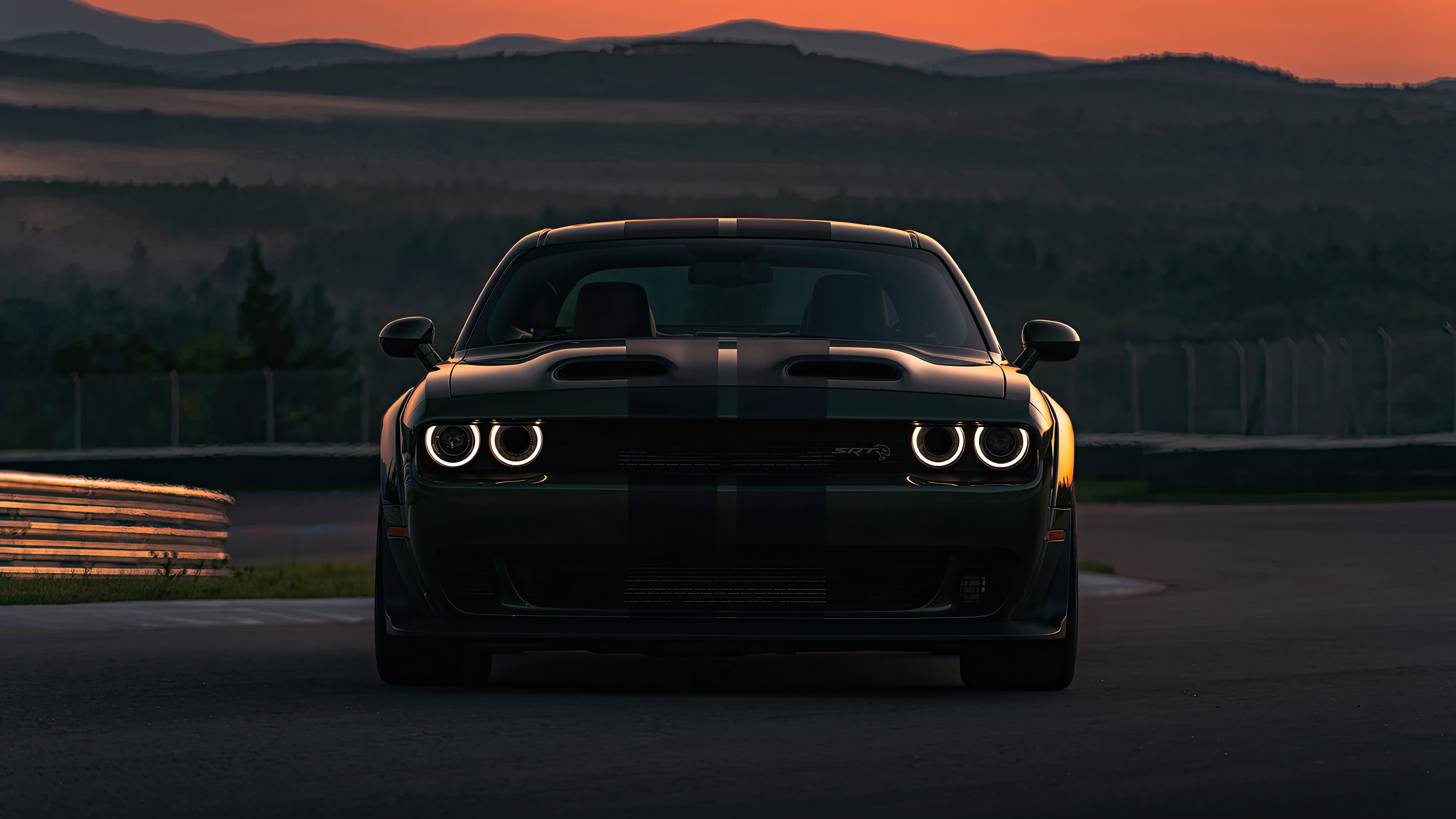 Dodge Challenger Outcast on a race track at sunset HD Wallpaper