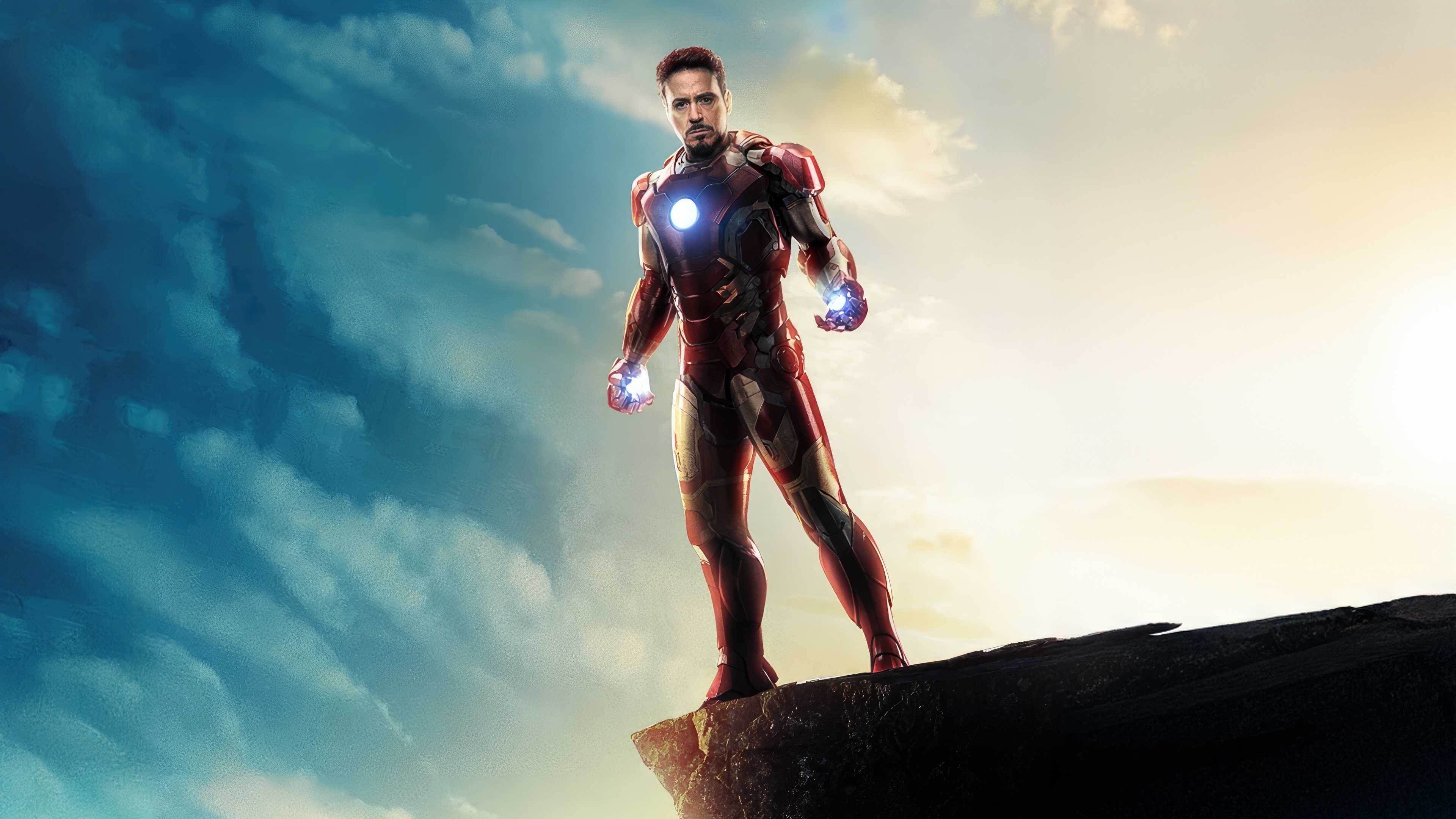Iron Man standing on a cliff edge HD Wallpaper