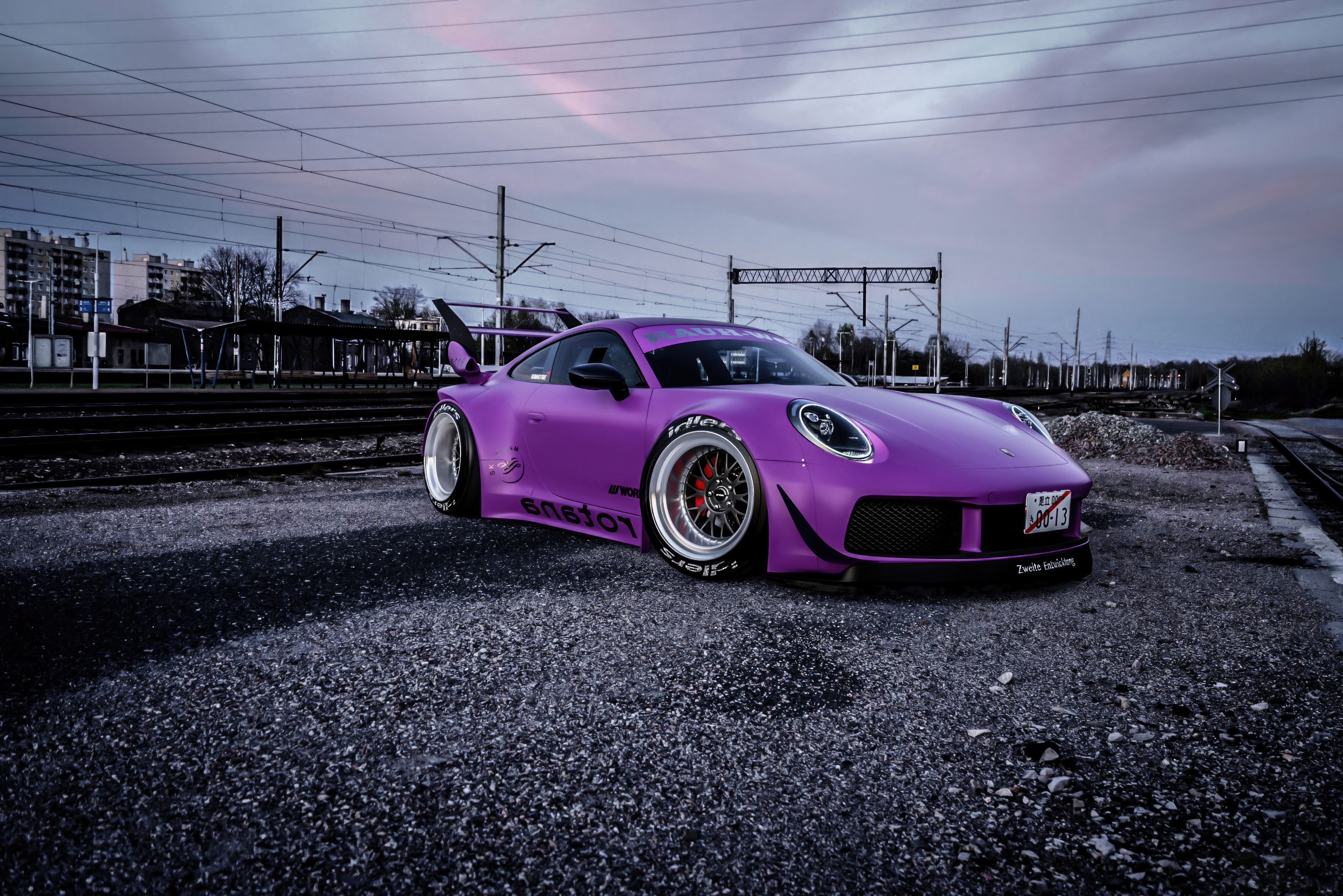 Purple Porsche 992 GT3 RS at Train Tracks HD Wallpaper