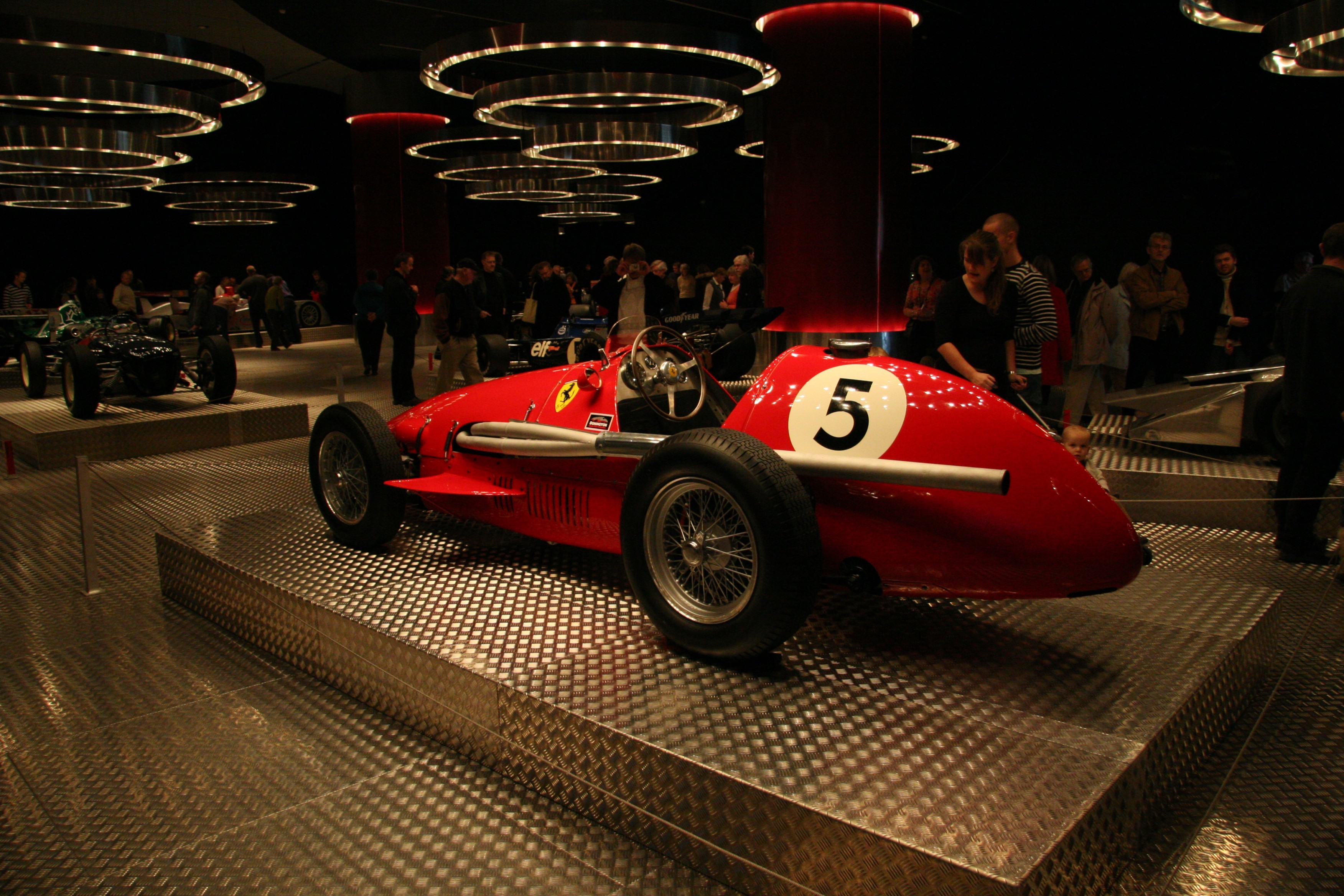 Red Ferrari Formula 1 car with number 5 HD Wallpaper