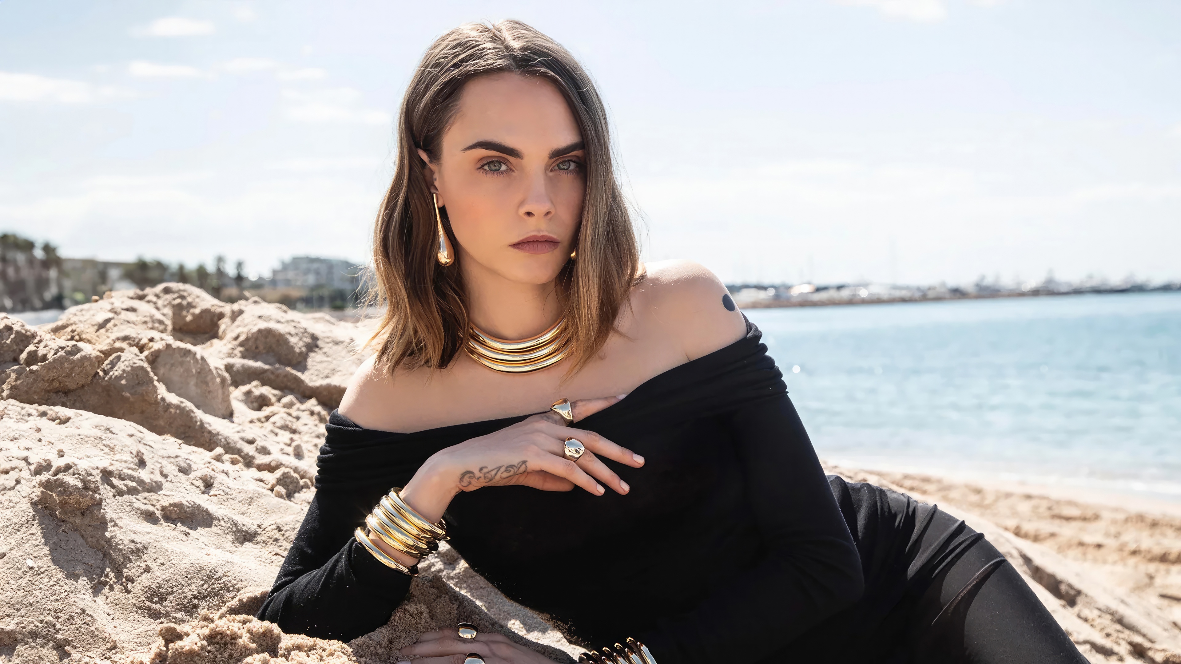 Cara Delevingne on a Beach HD Wallpaper