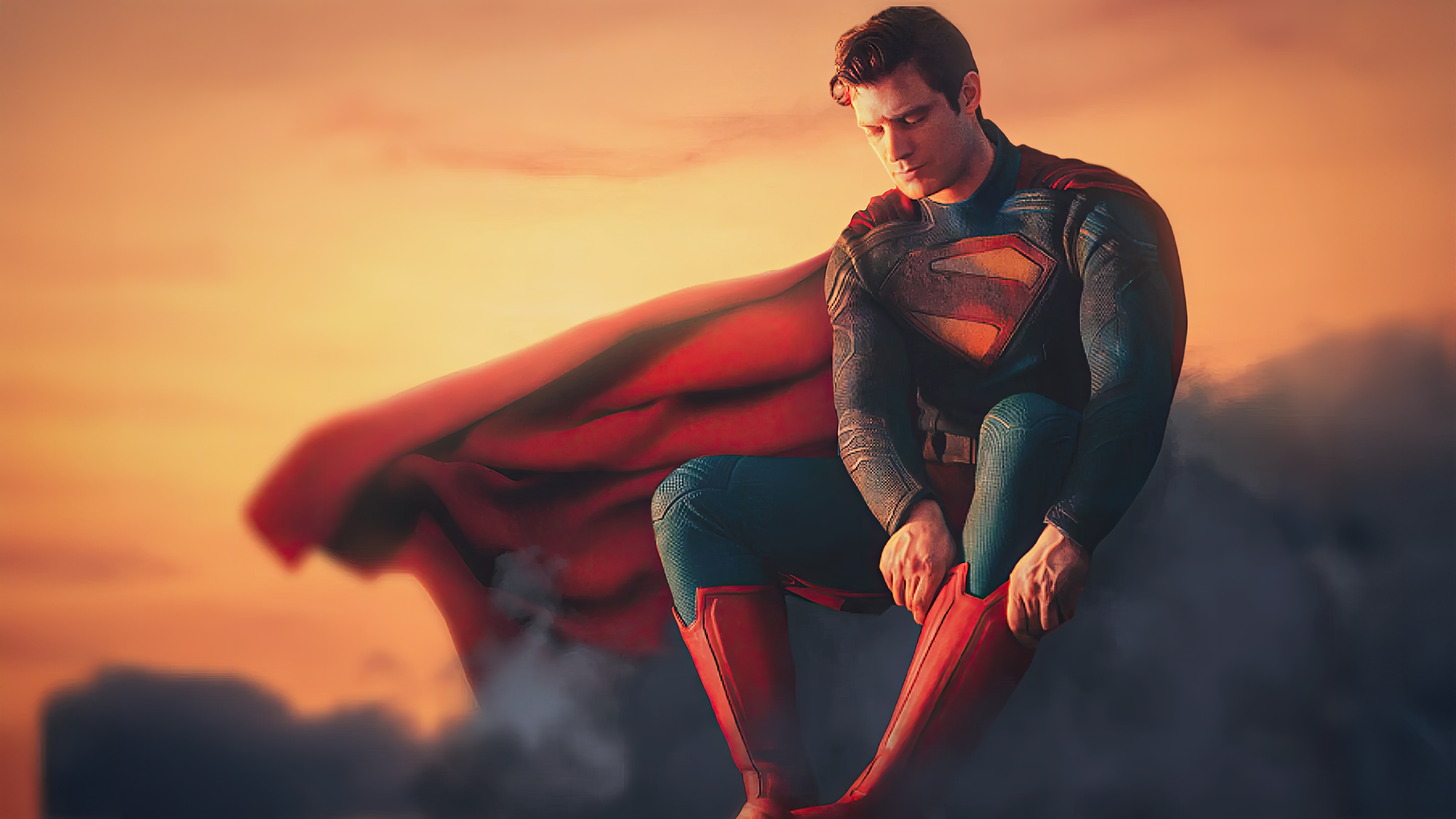 David Corenswet as Superman adjusting his boots HD Wallpaper