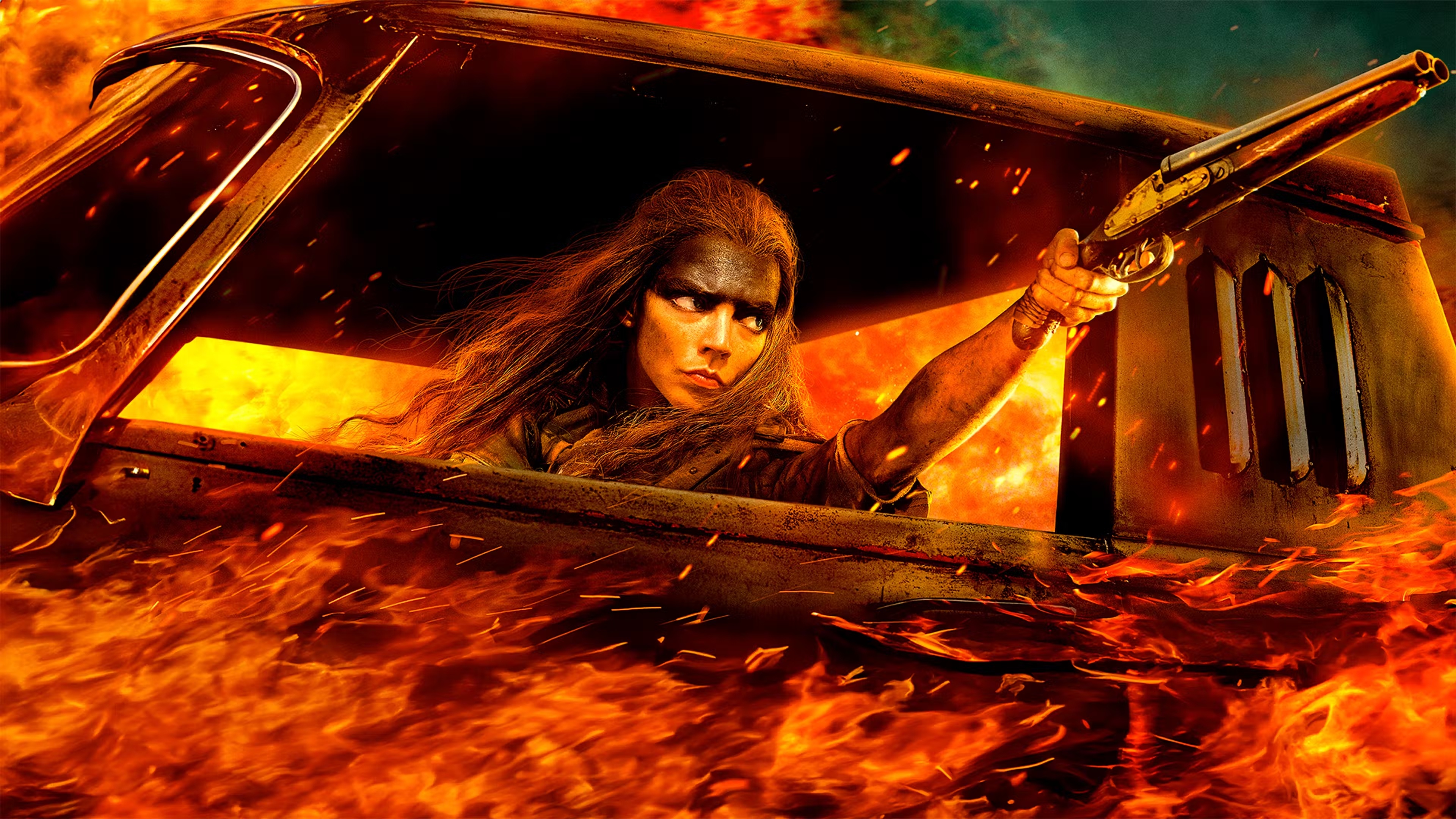 Furiosa in a burning vehicle with a shotgun HD Wallpaper