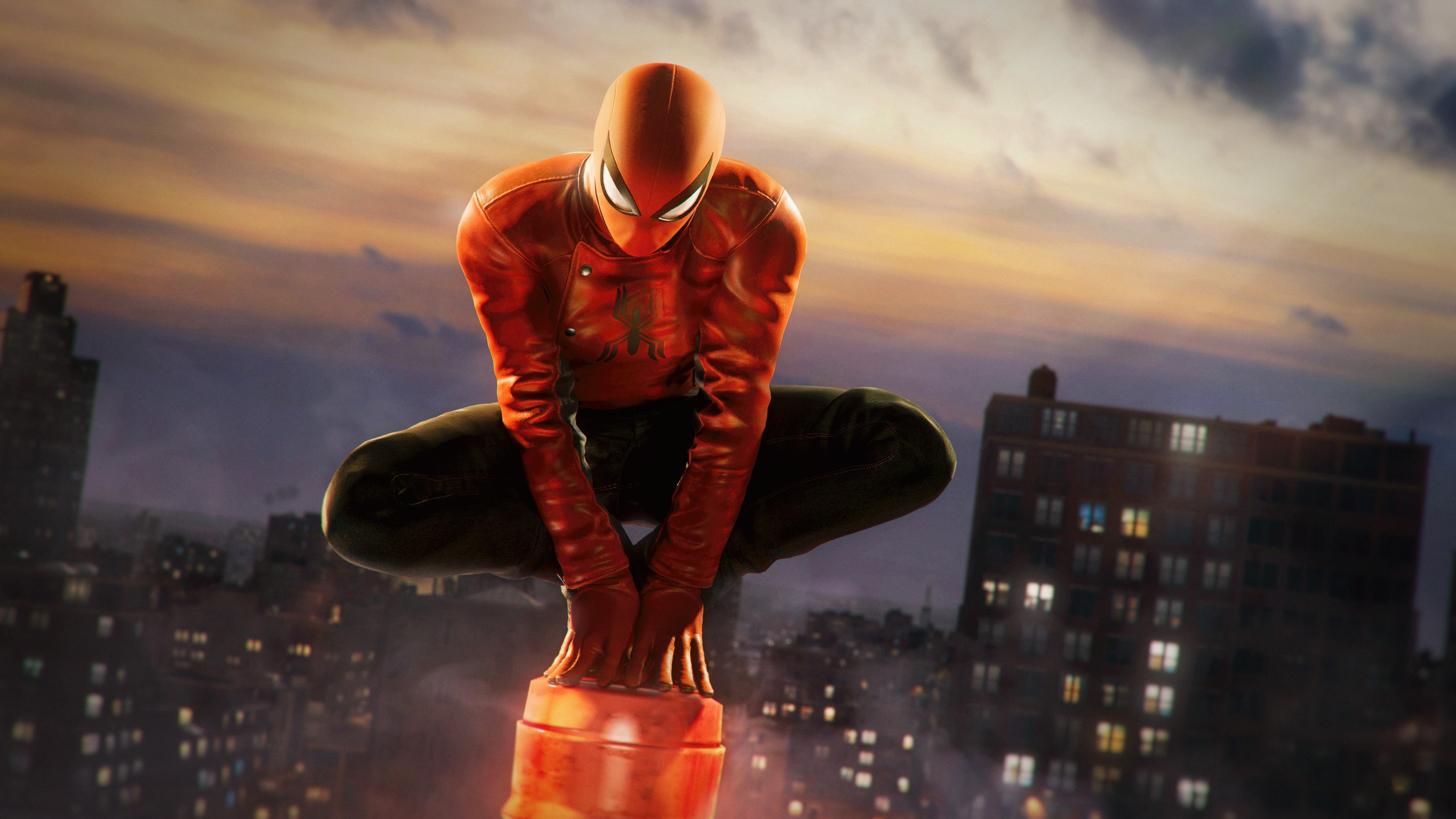 Spider-Man crouches on a building at sunset HD Wallpaper