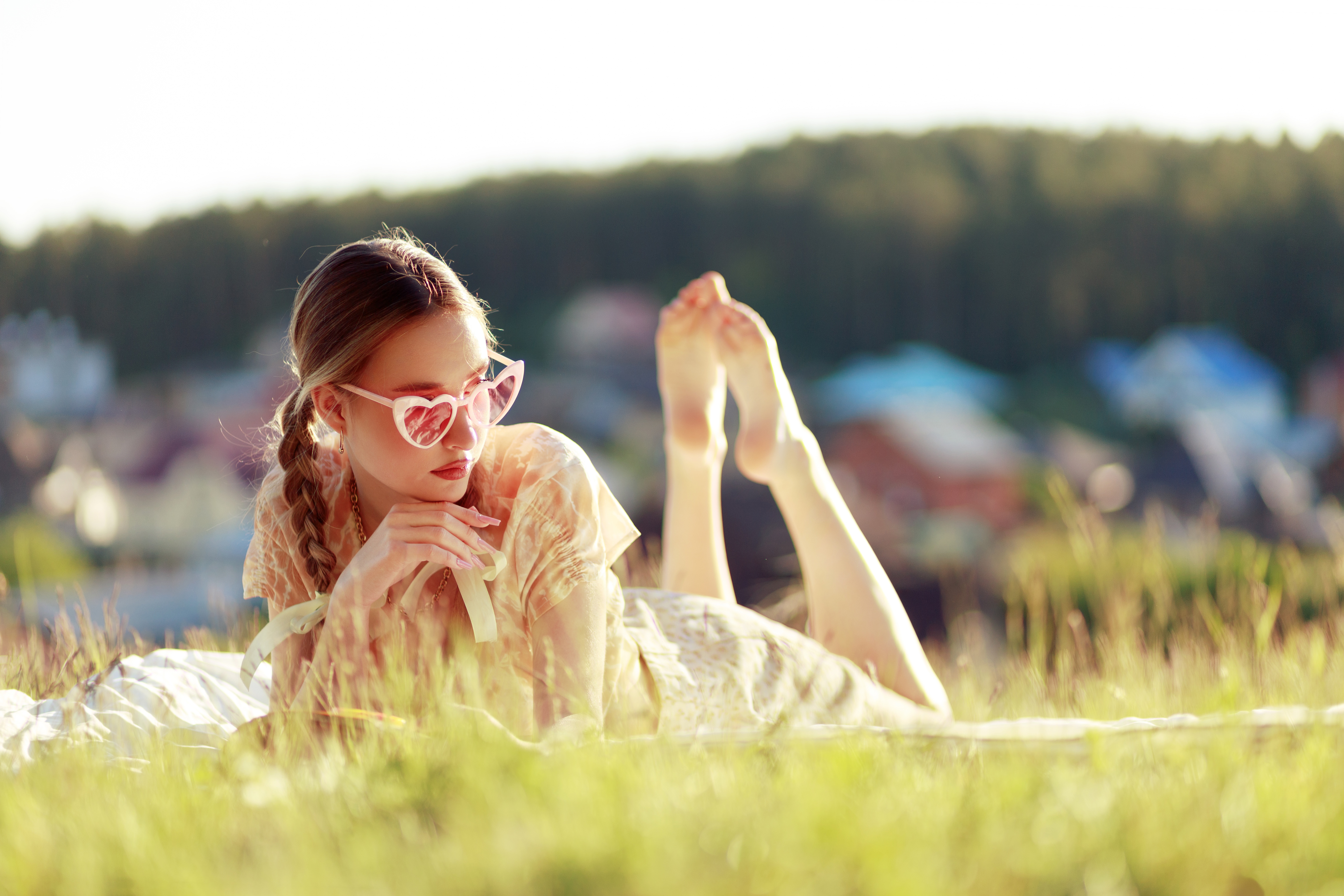 Girl in heart sunglasses lying in grass HD Wallpaper
