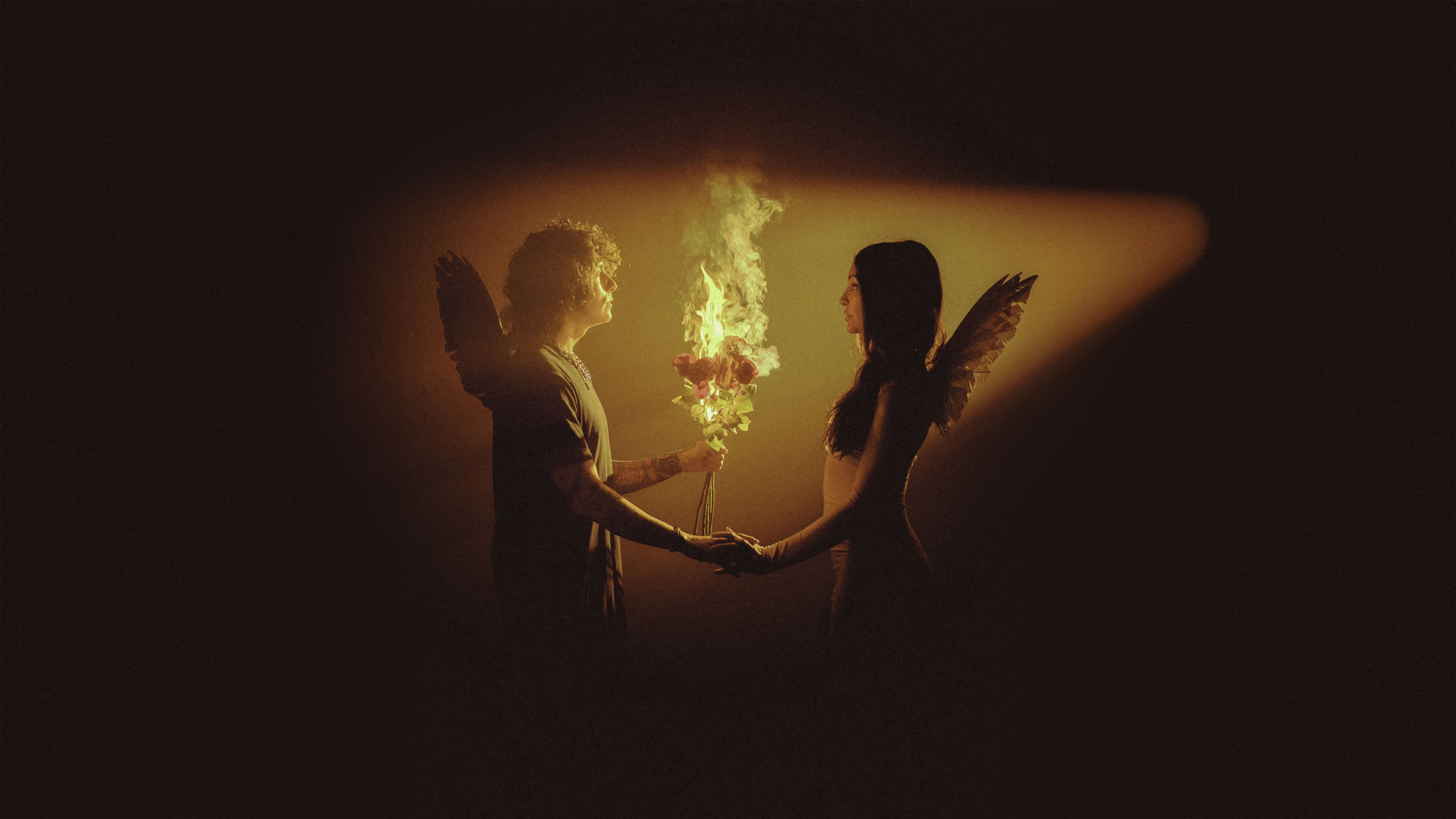 Angel couple holding burning roses HD Wallpaper
