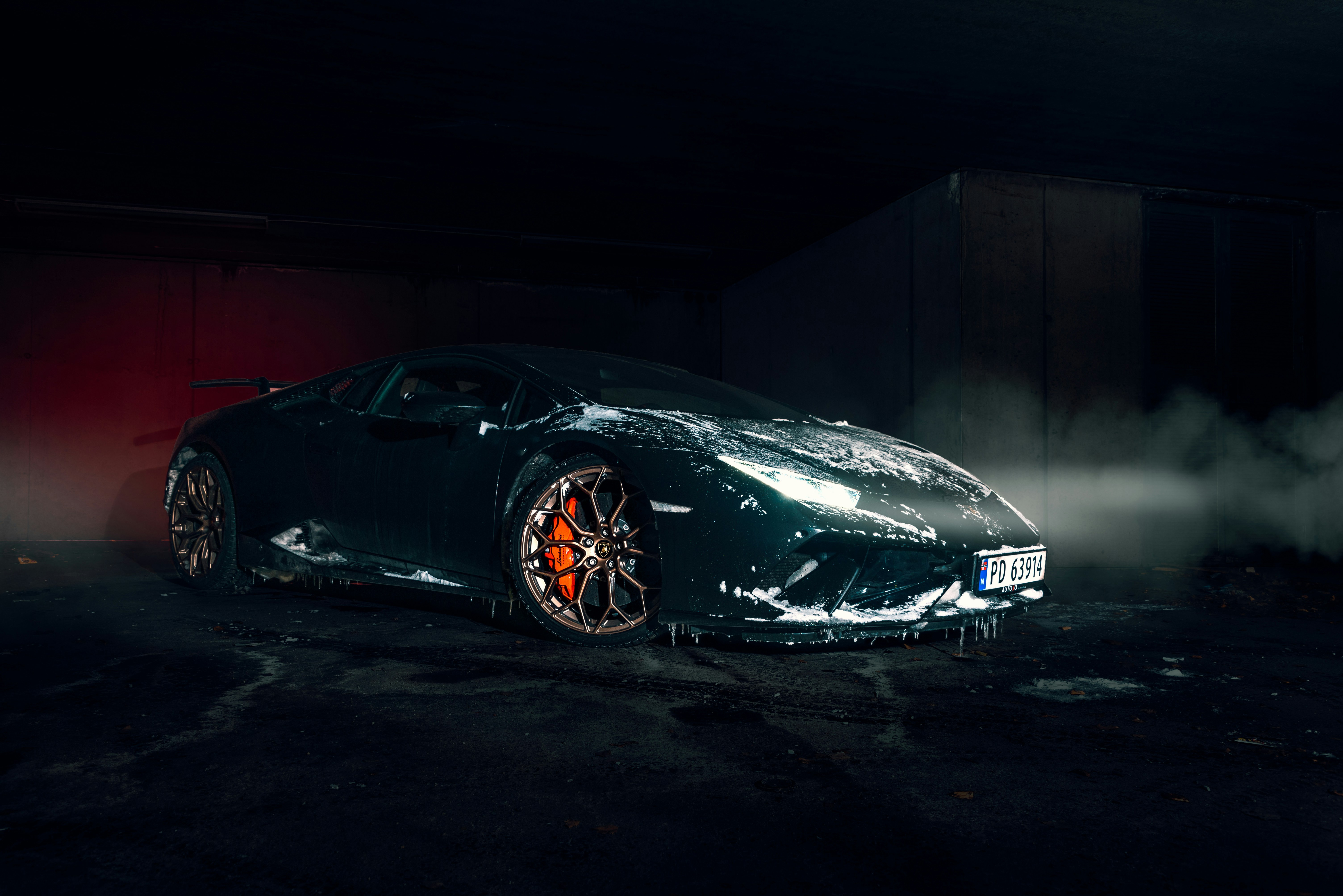 Green Lamborghini Huracan covered in snow HD Wallpaper