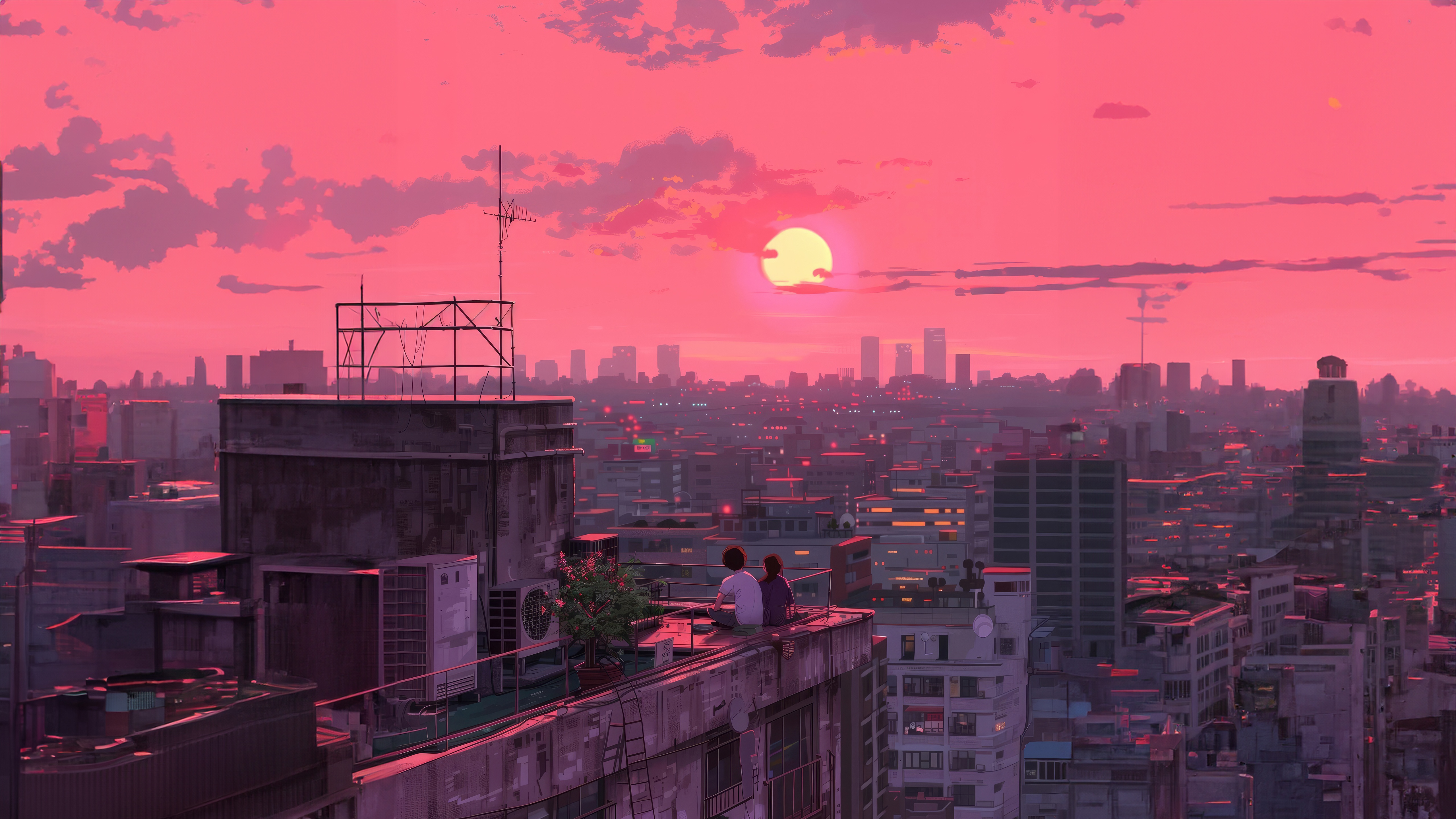 Two people sitting on a rooftop at sunset HD Wallpaper
