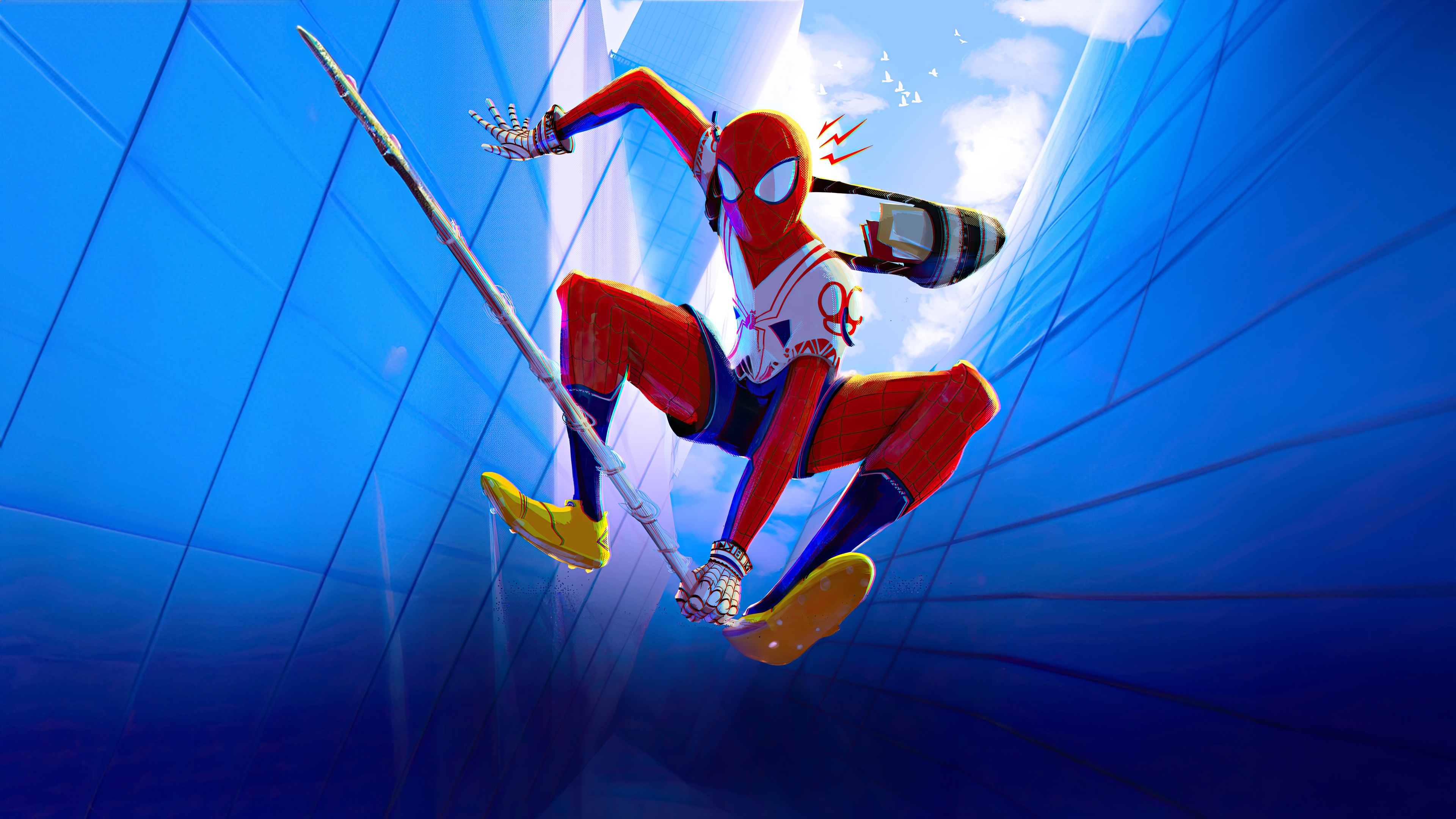 Spider-Man swinging between buildings HD Wallpaper