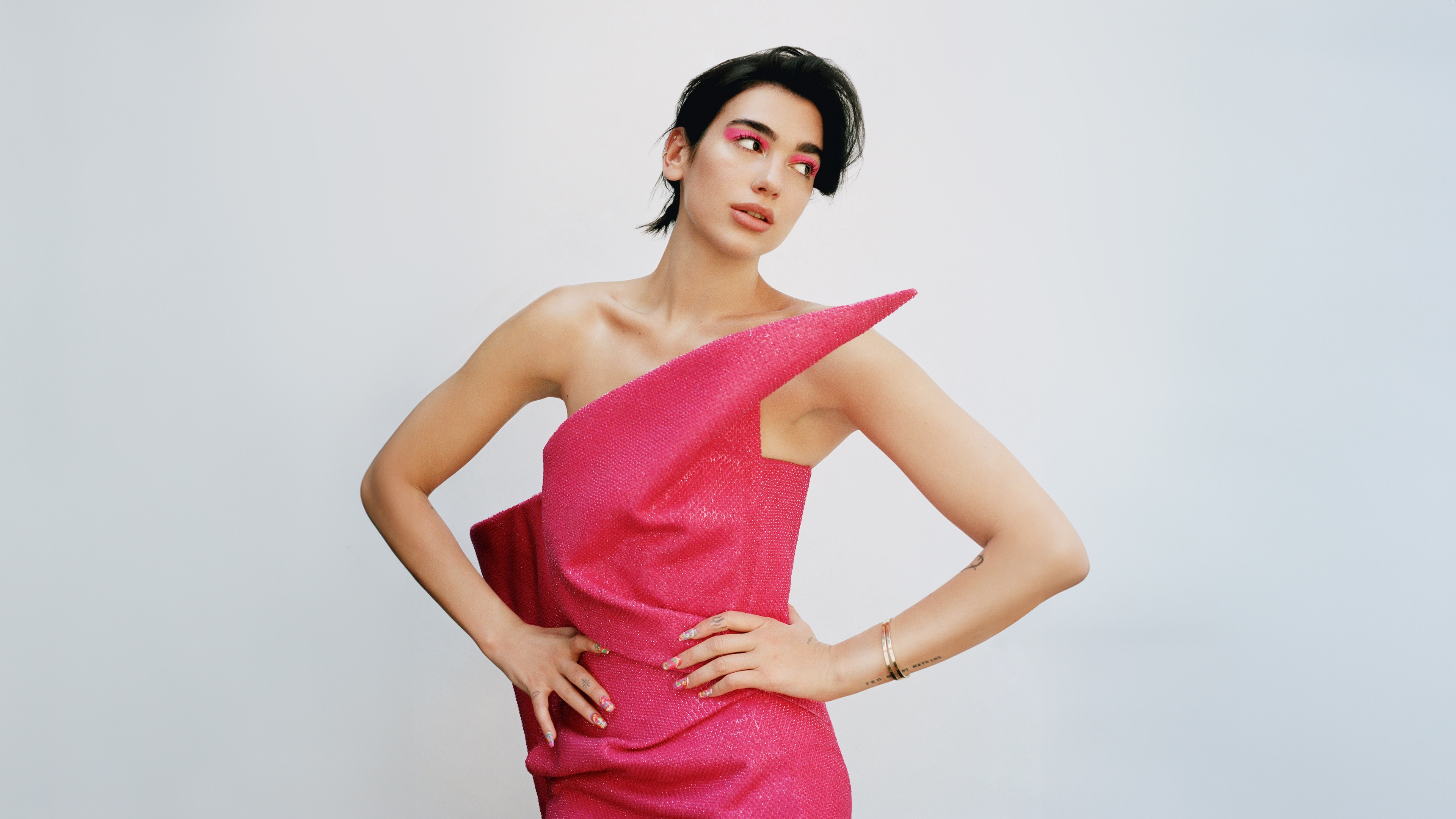 Dua Lipa in a pink dress for Vogue HD Wallpaper