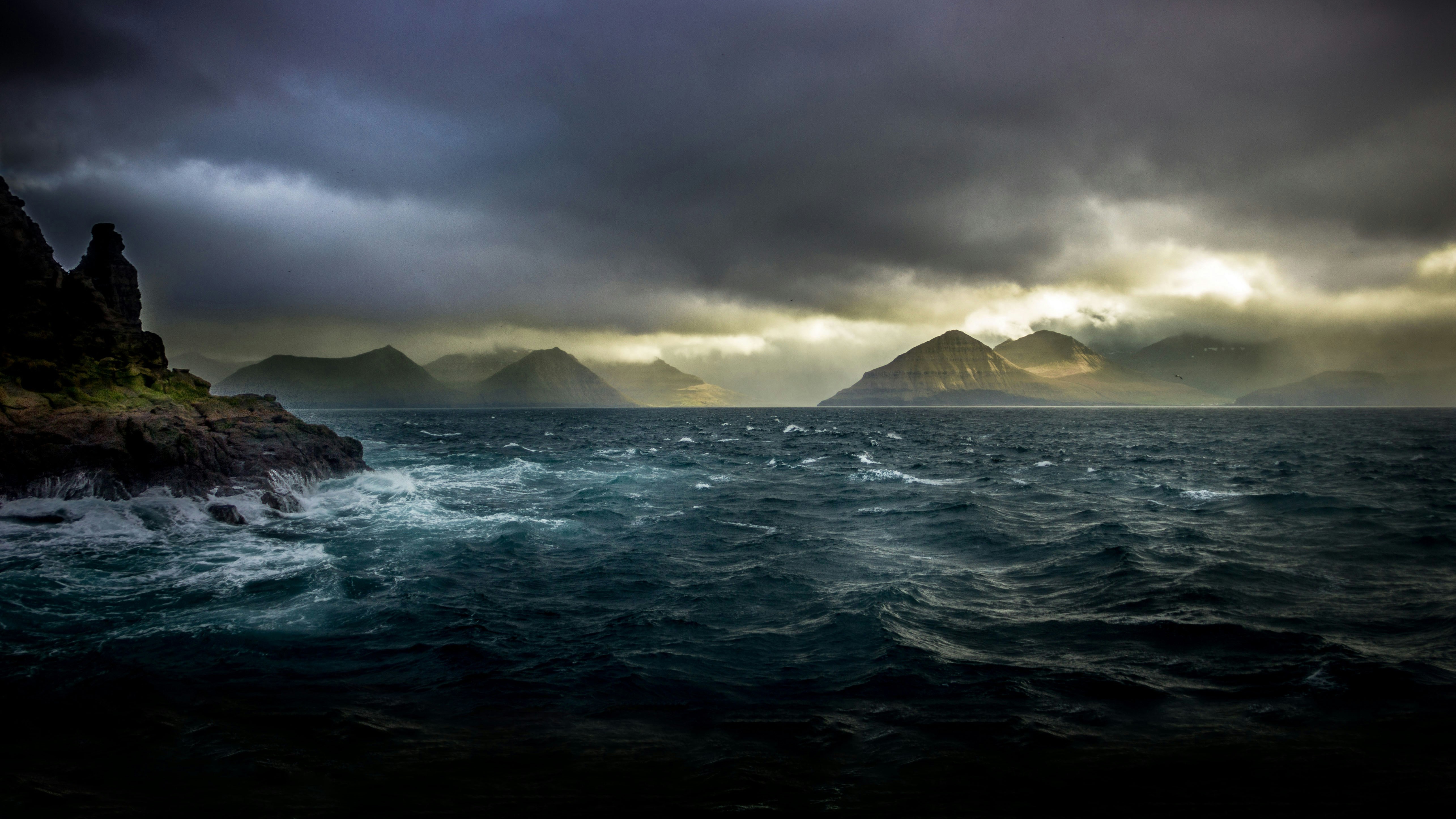 Majestic Mountains Under Stormy Skies HD Wallpaper